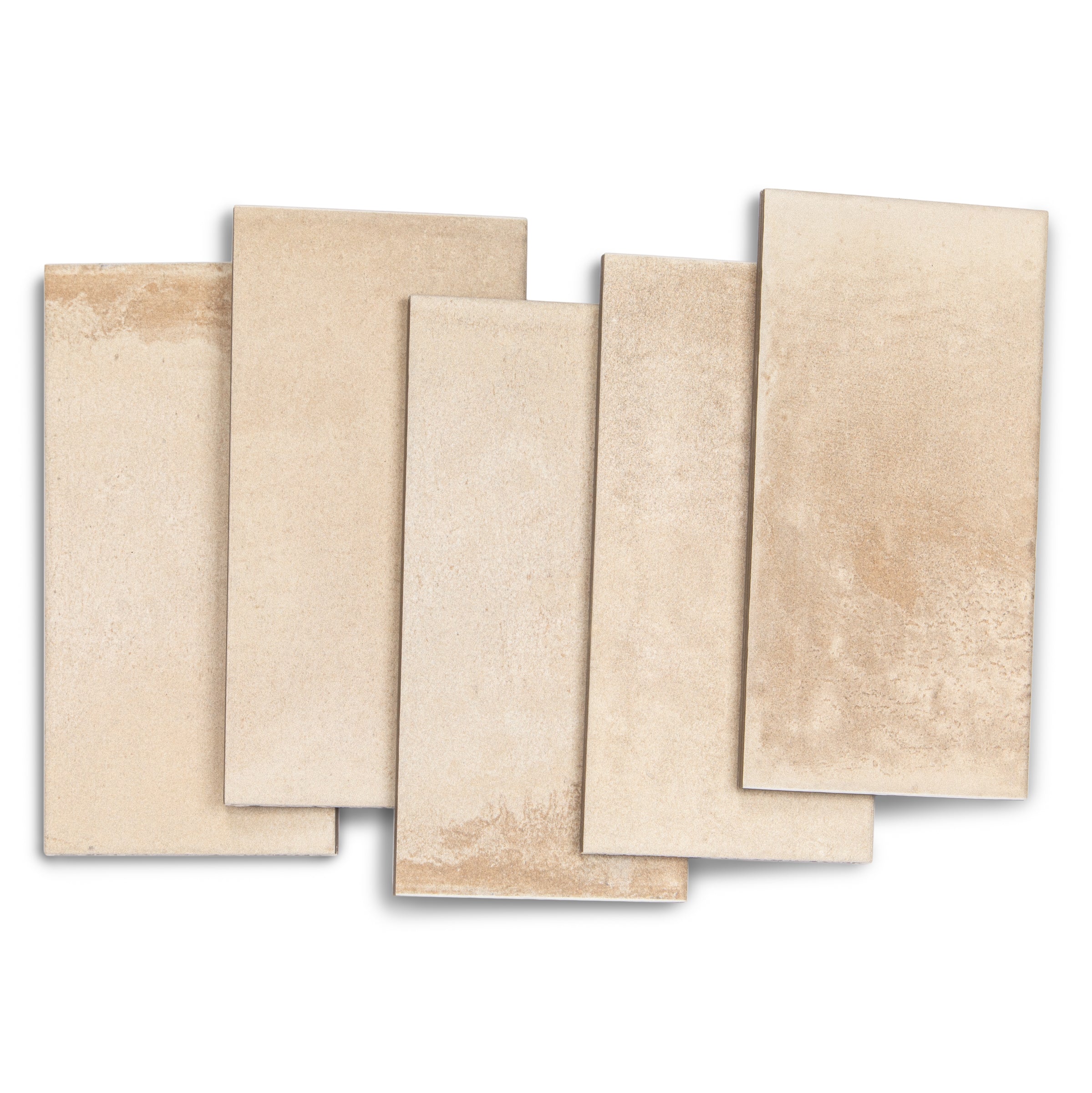 Five rectangular porcelain tiles in soft natural beige tones with subtle texture and gentle color variation on white background