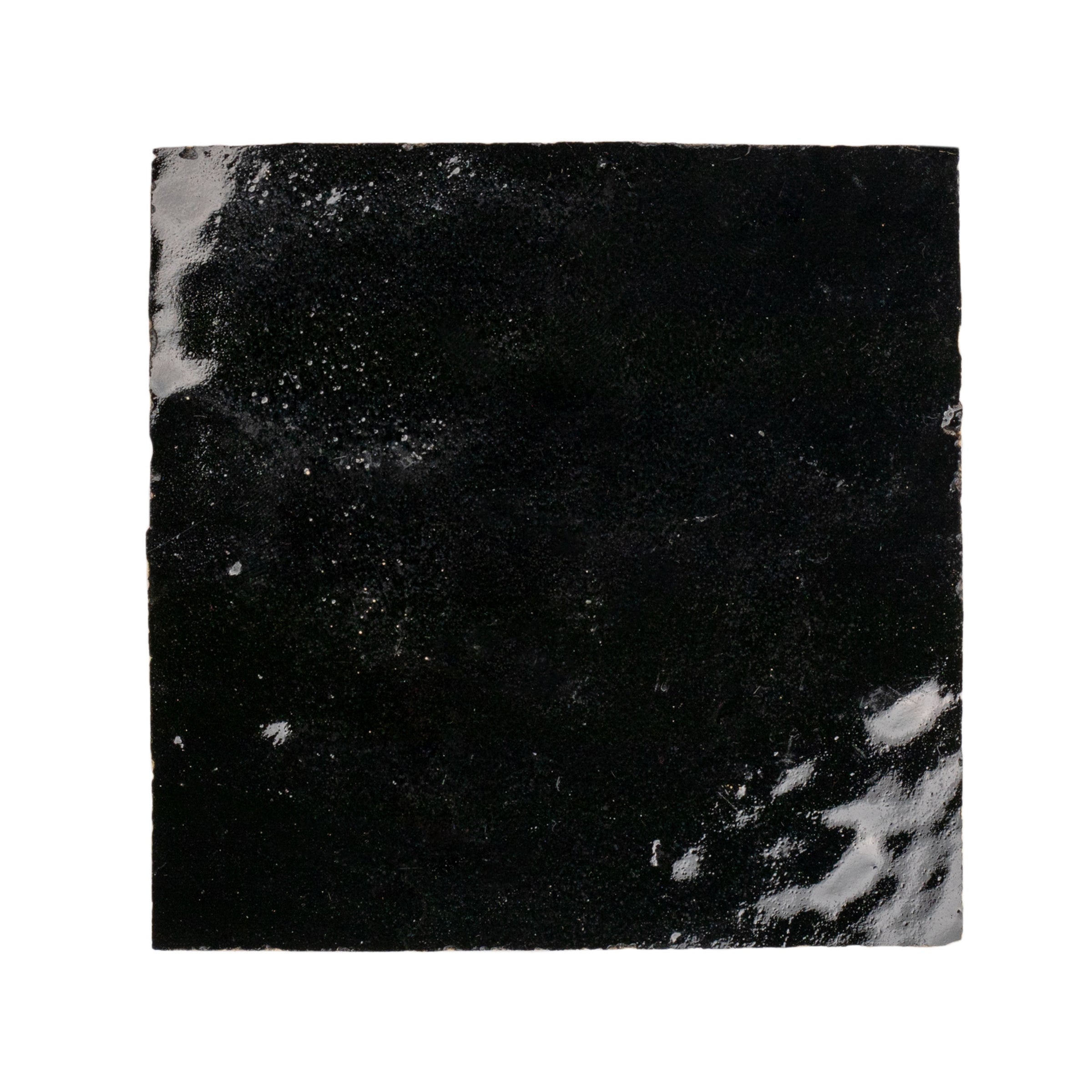 Black 4x4 Glazed Zellige Tile Sample showcasing glossy ceramic texture from SAMPLES ONLY collection, globally sourced for your imagination