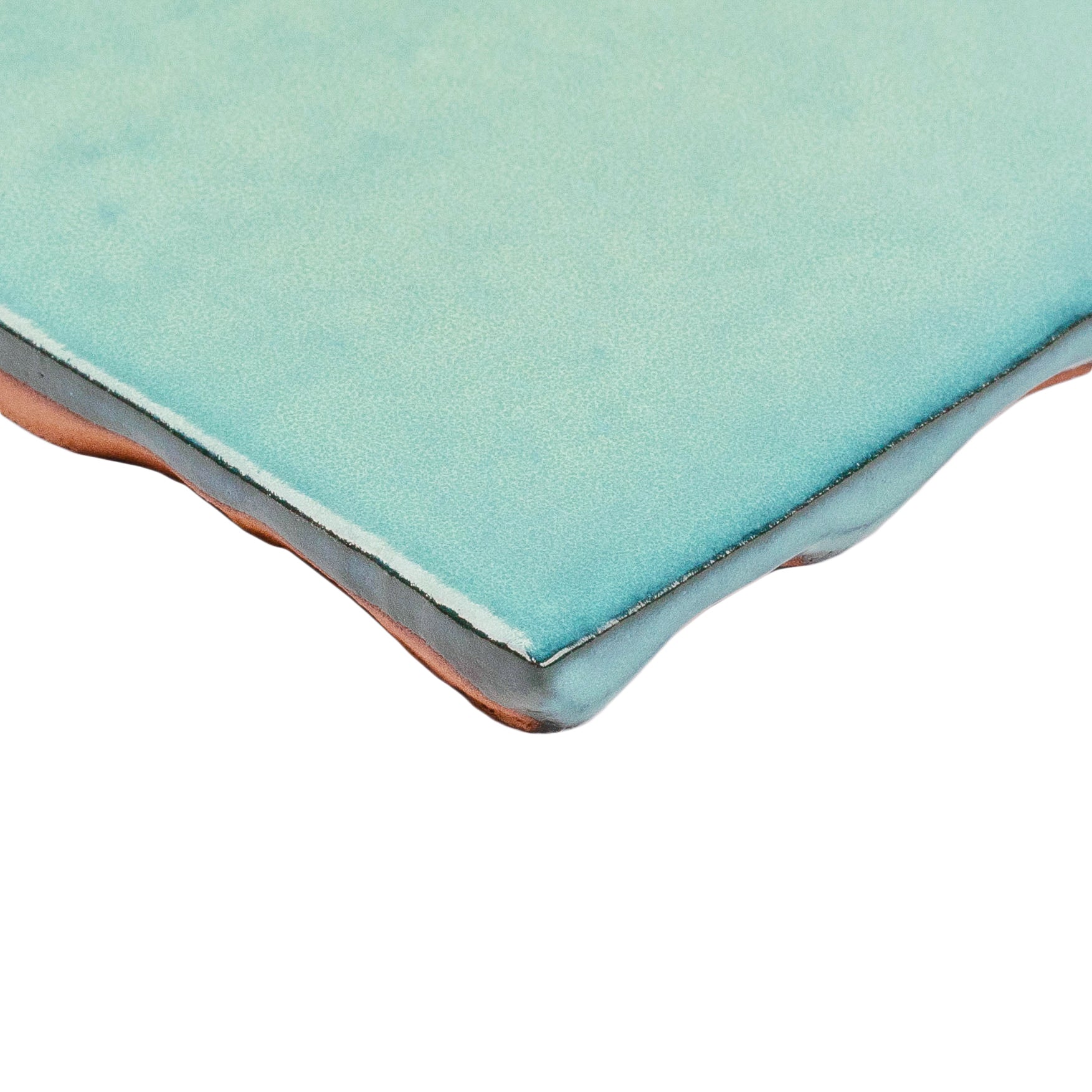 Turquoise Glossy Ceramic Tile with handcrafted texture and vibrant finish from Small Format Tiles and Zel Glazed Ceramic Tiles collections