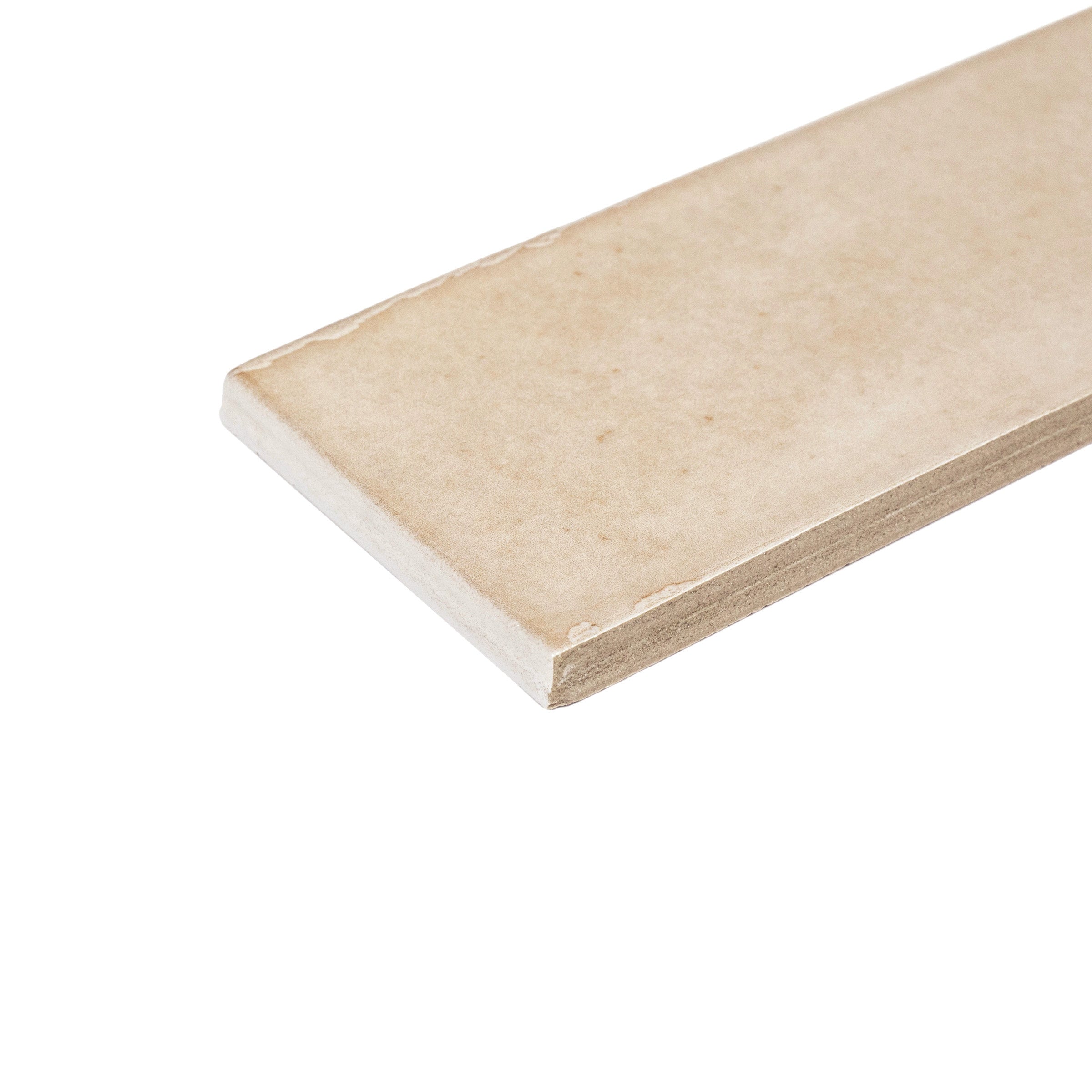 Matte bone-colored ceramic tile with smooth surface and slight natural variations isolated on white background