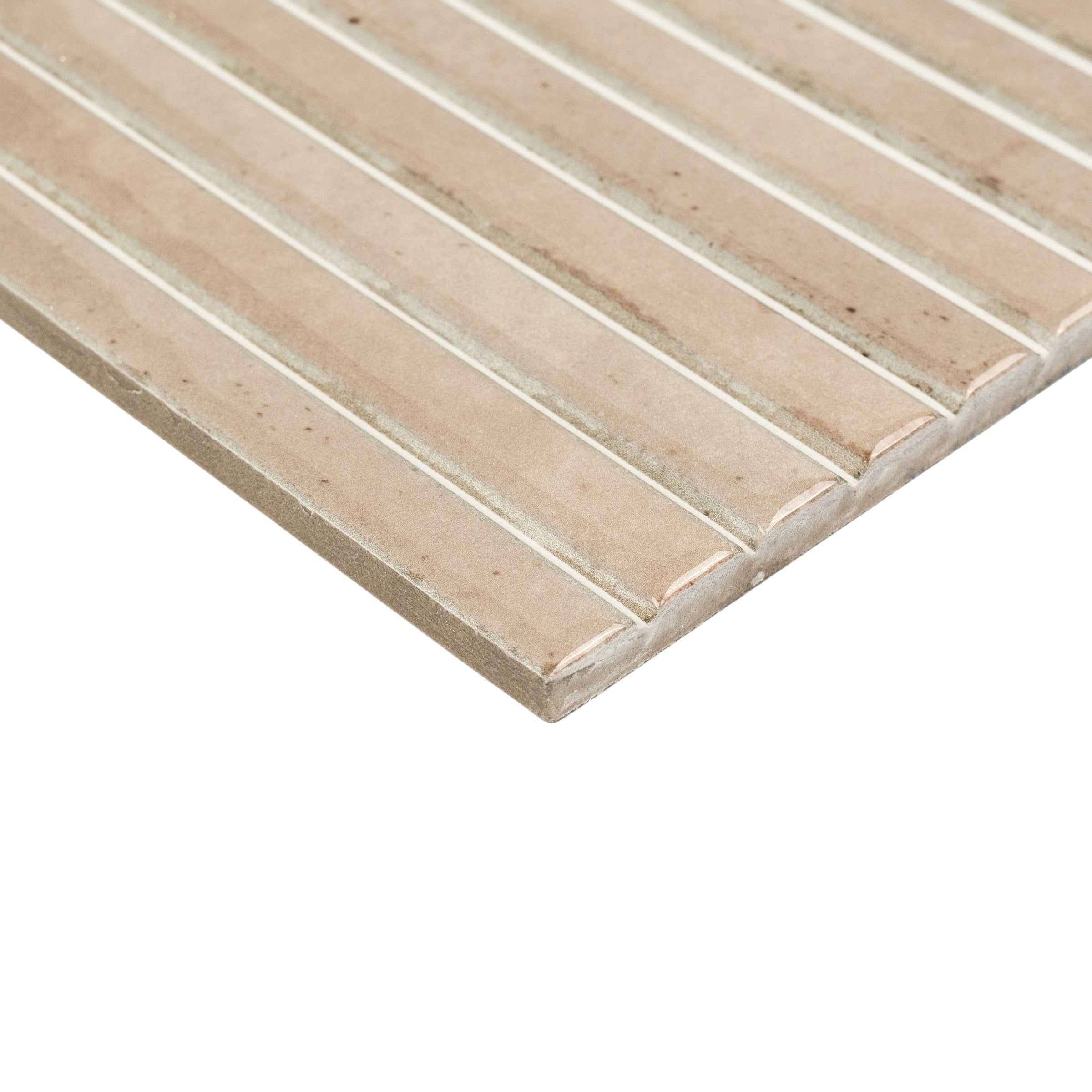 Close-up of beige ceramic tile with narrow white grout lines and subtle texture on the surface