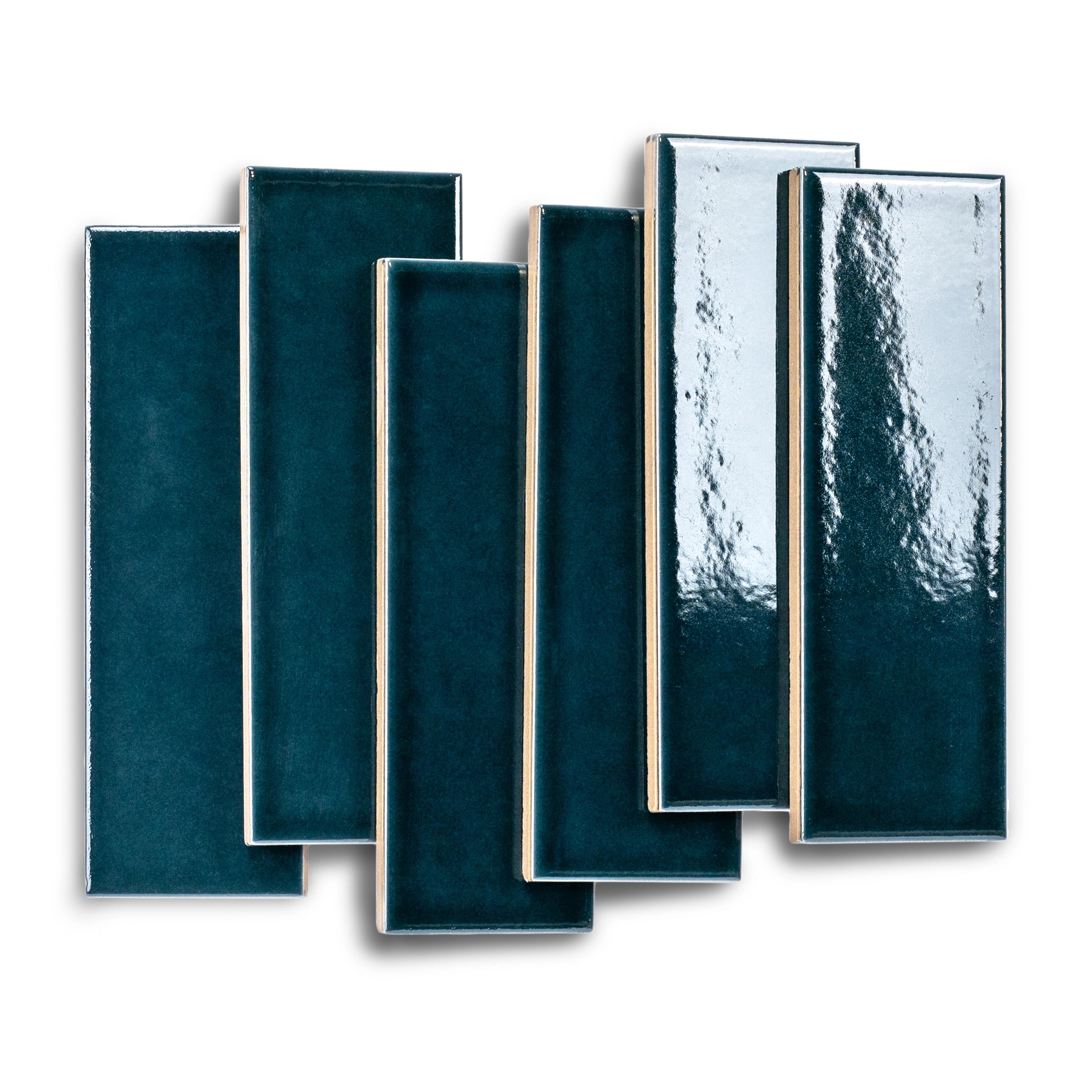 Glossy rectangular ceramic tiles in deep teal with varied surface textures and smooth edges on white background