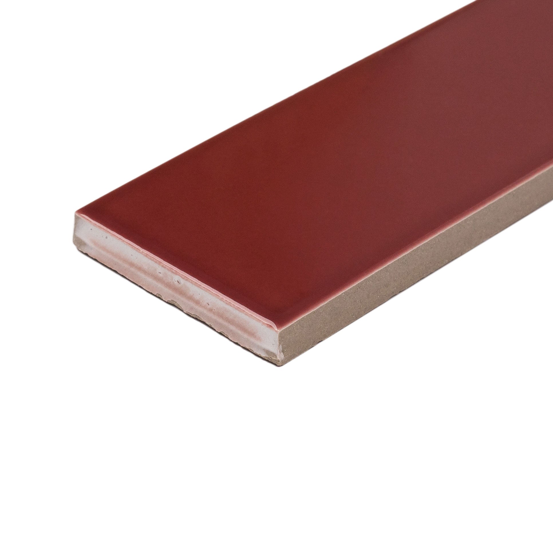 Glossy narrow porcelain tile in warm burgundy with smooth finish and clean edges on white background