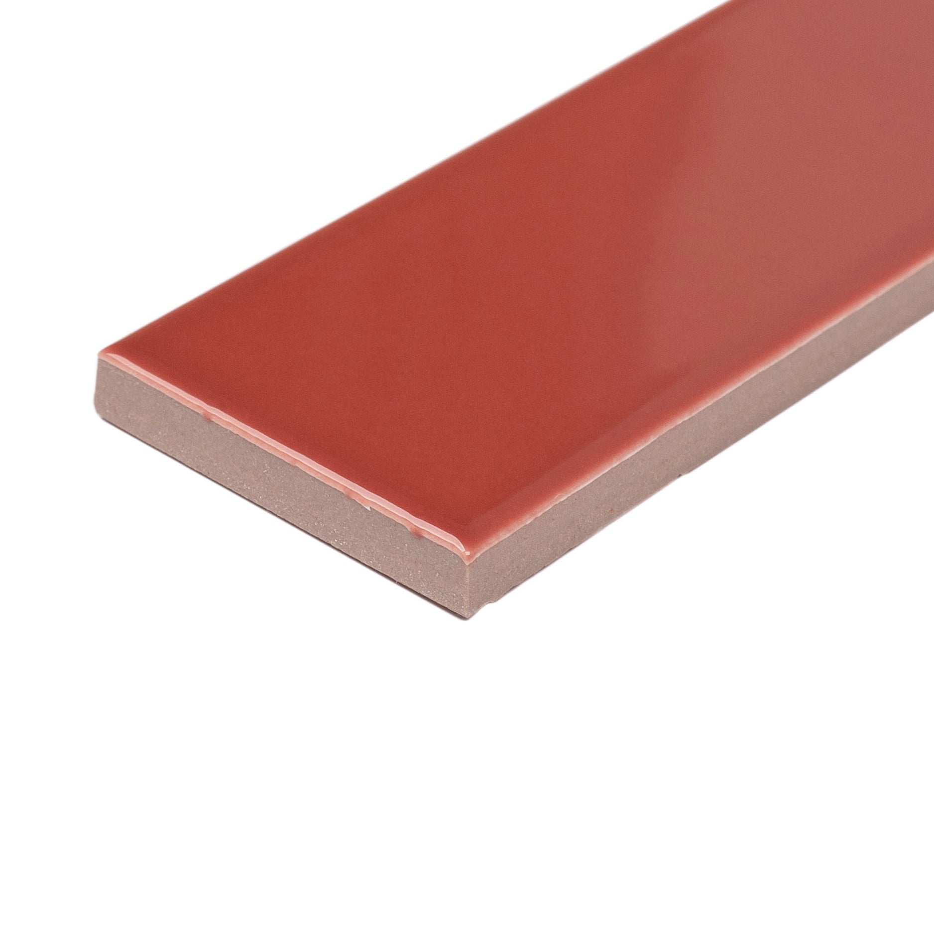 Smooth porcelain tile in a warm cinnamon shade with a glossy finish and clean, precise edges on white background