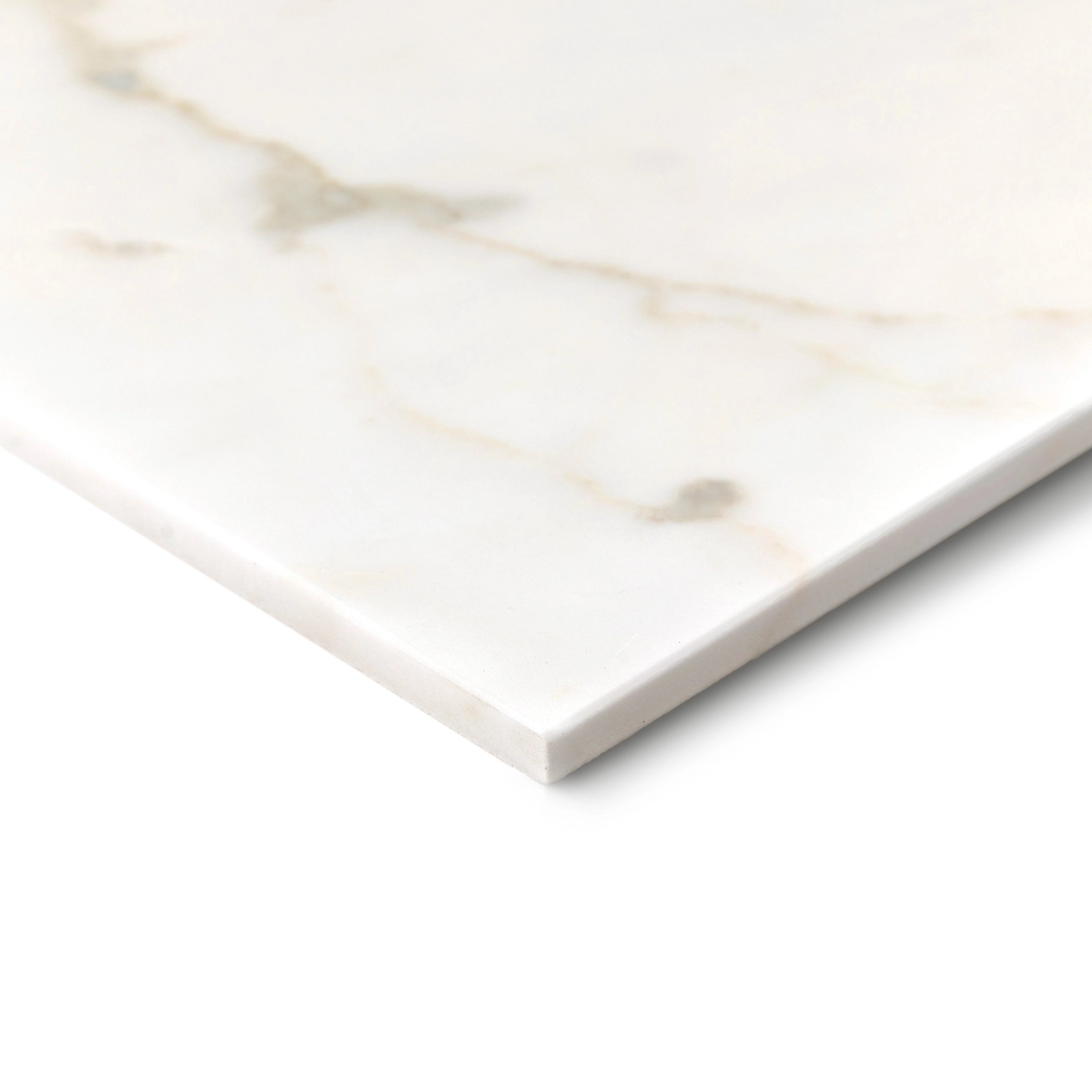 Close-up of smooth porcelain tile with soft white surface and delicate light beige veining resembling natural stone patterns