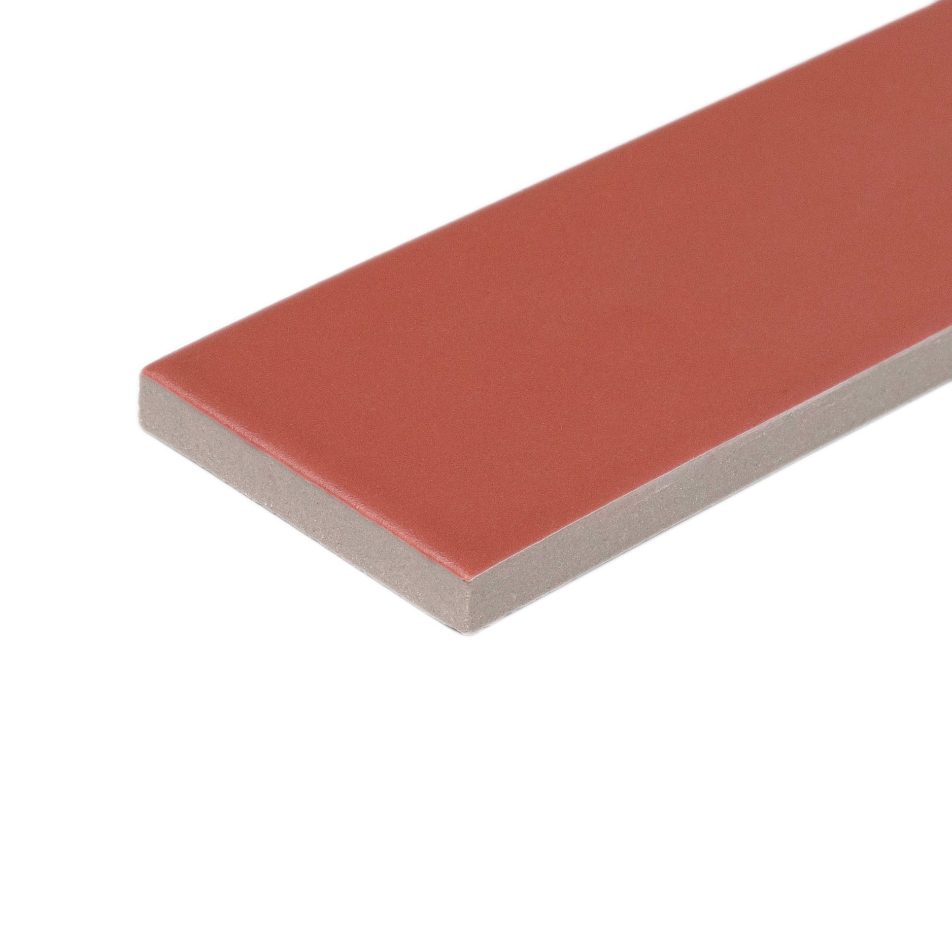 Matte rectangular ceramic tile in warm cinnamon shade with smooth surface and clean straight edges on white background
