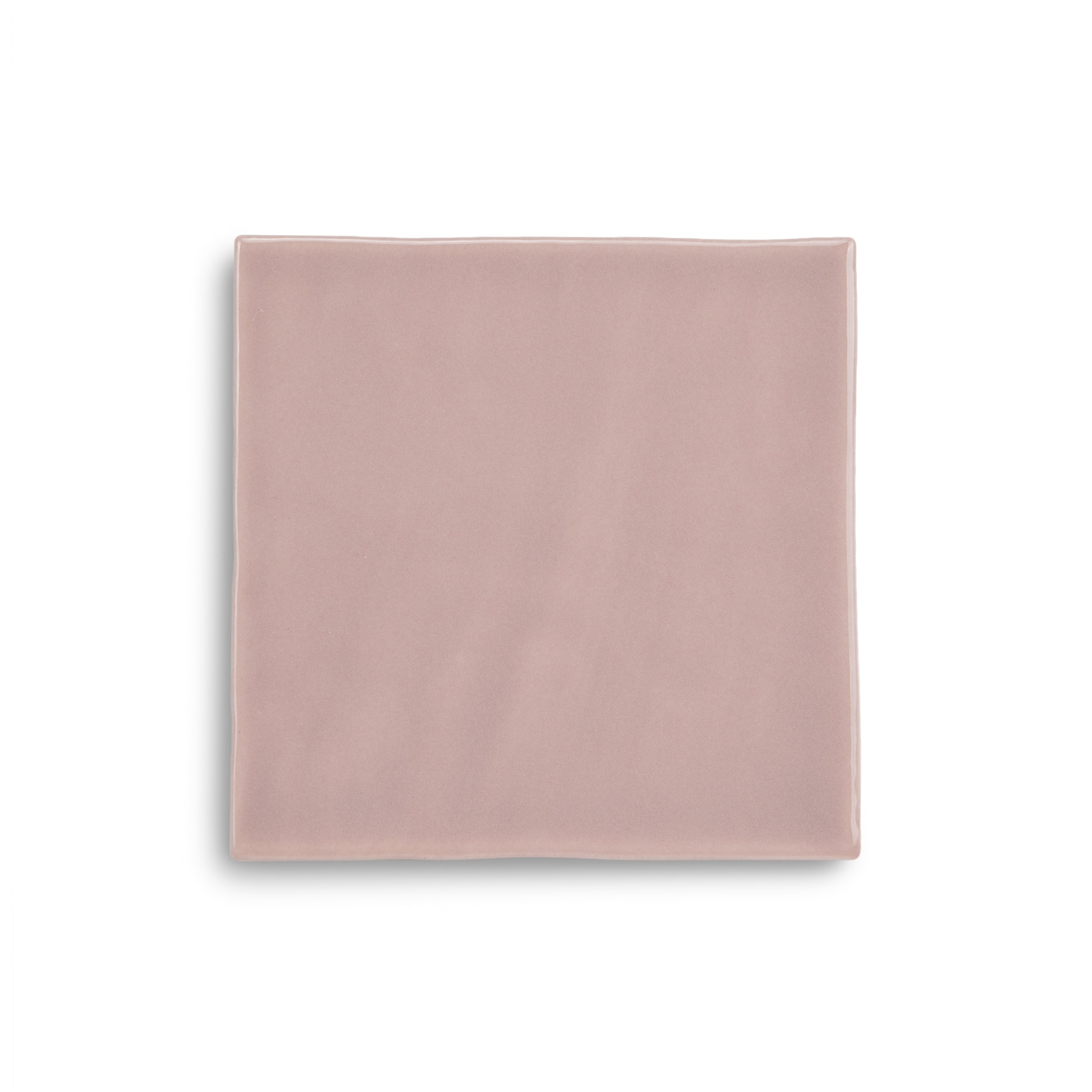 Square blush pink ceramic tile with a smooth matte finish