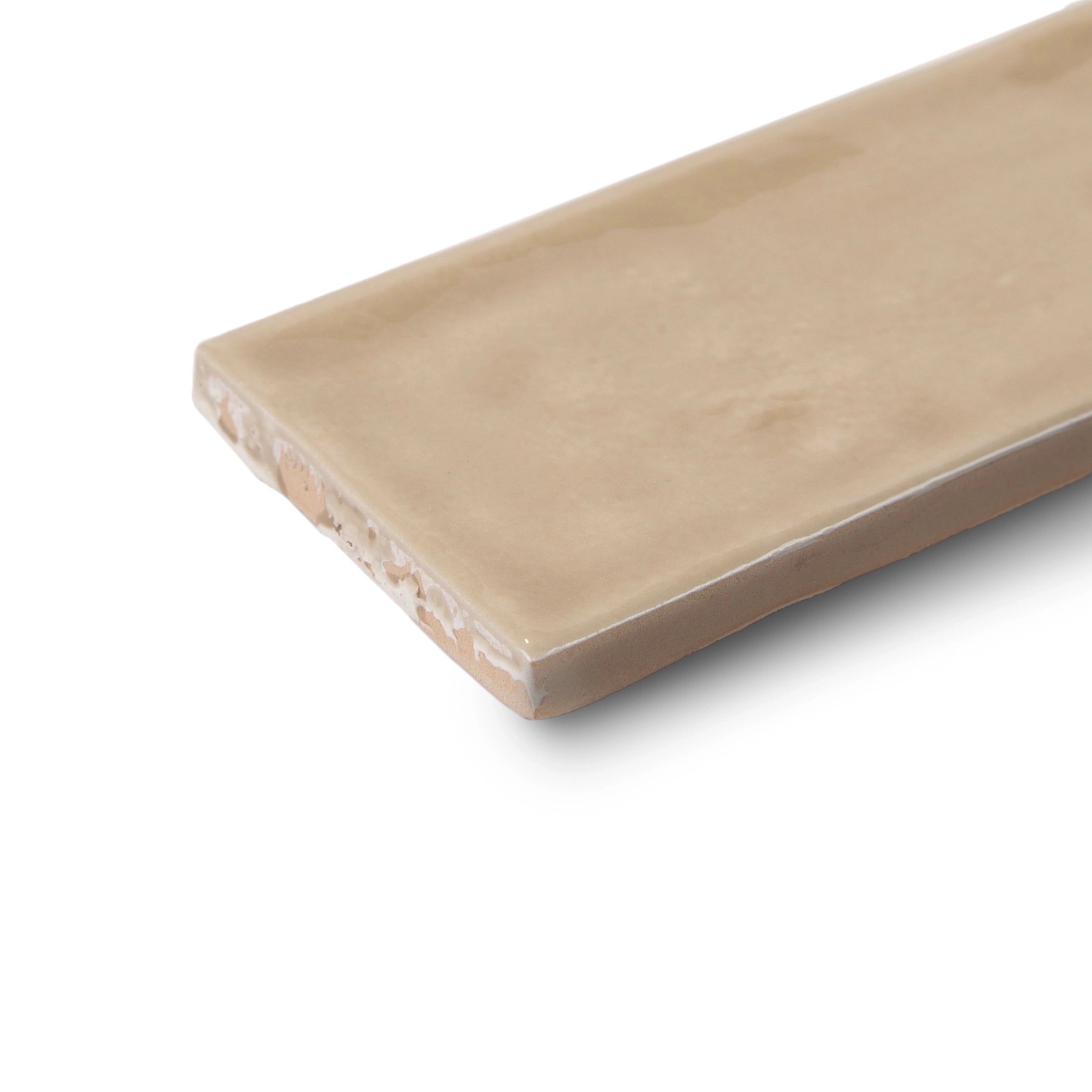 Soft beige rectangular ceramic tile with a smooth, slightly glossy surface and subtle texture on white background