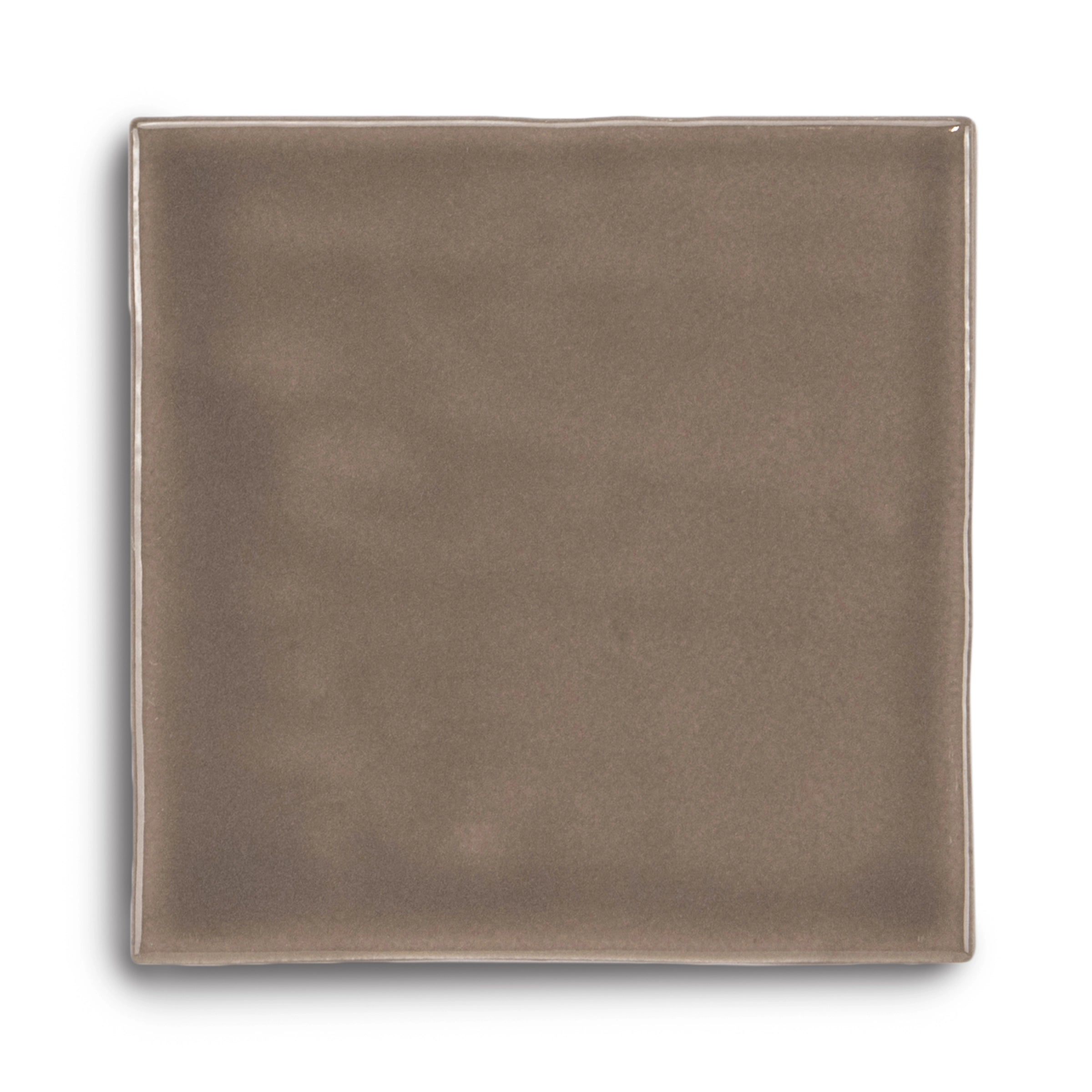 Square ceramic tile in muted clay brown with a smooth, glossy surface and subtle color variations