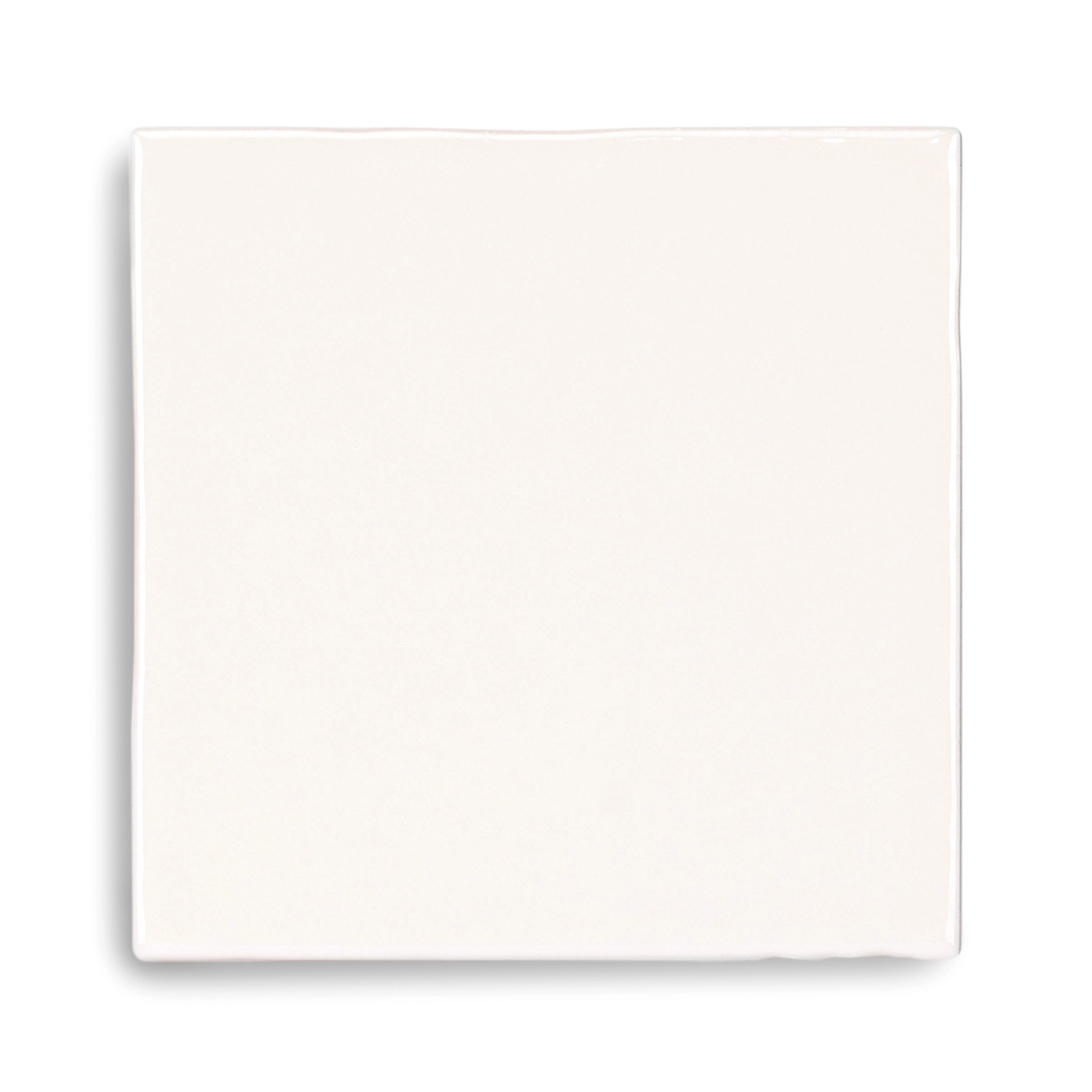 Square ceramic tile in creamy off-white with a smooth surface and soft, subtle natural variations