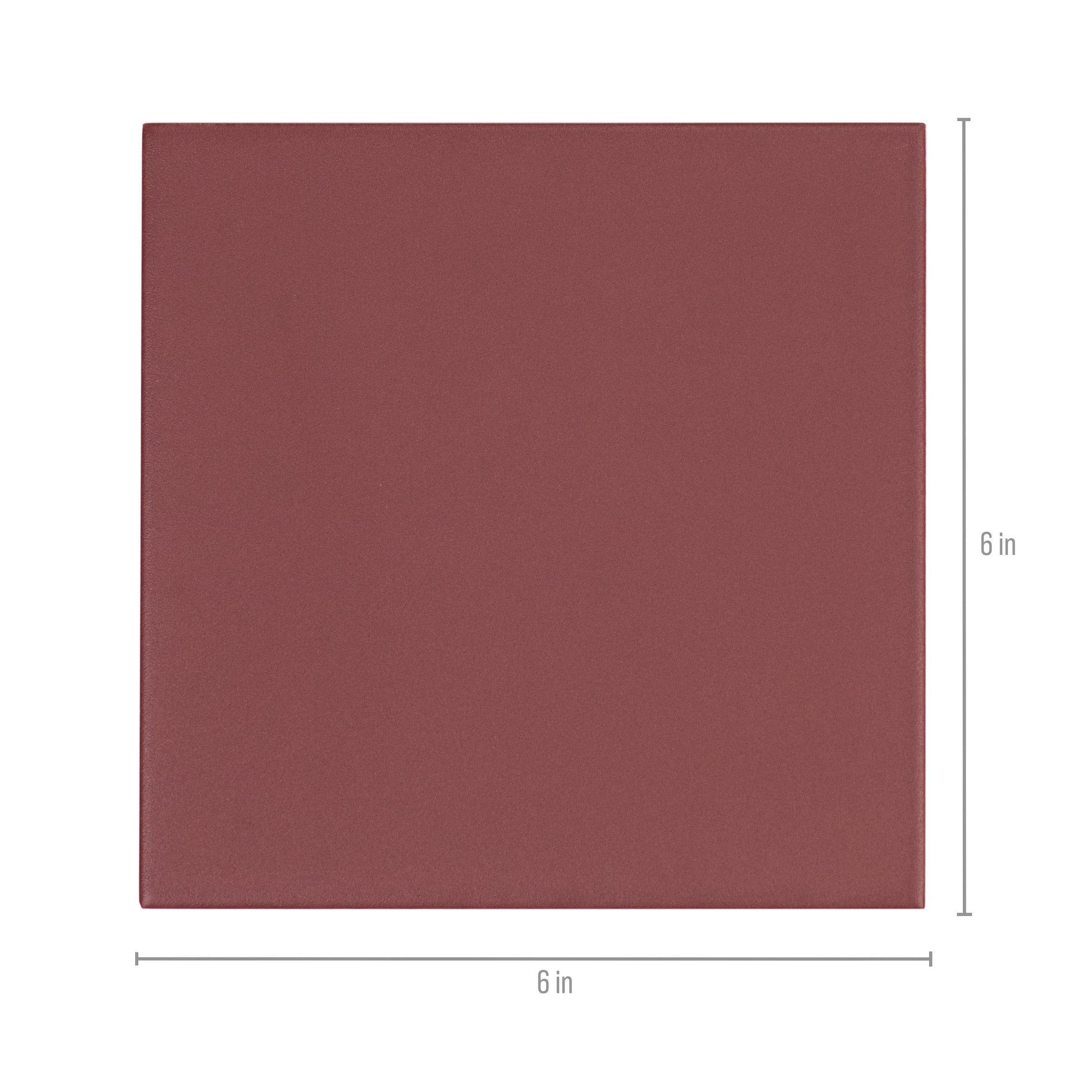 Square ceramic tile in muted terracotta color with smooth surface and clean edges suitable for flooring or walls