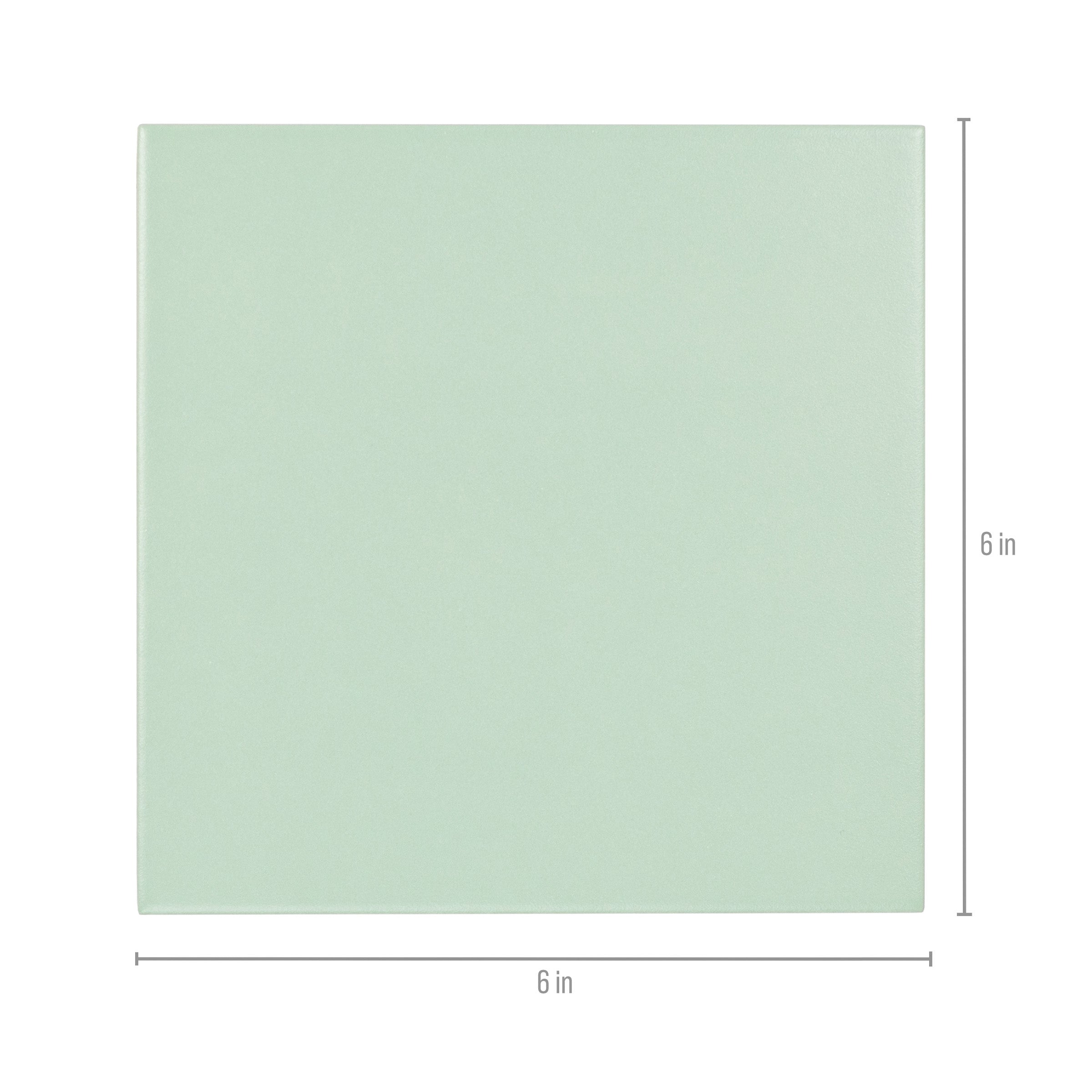 Square light green ceramic tile measuring six inches by six inches with smooth matte finish