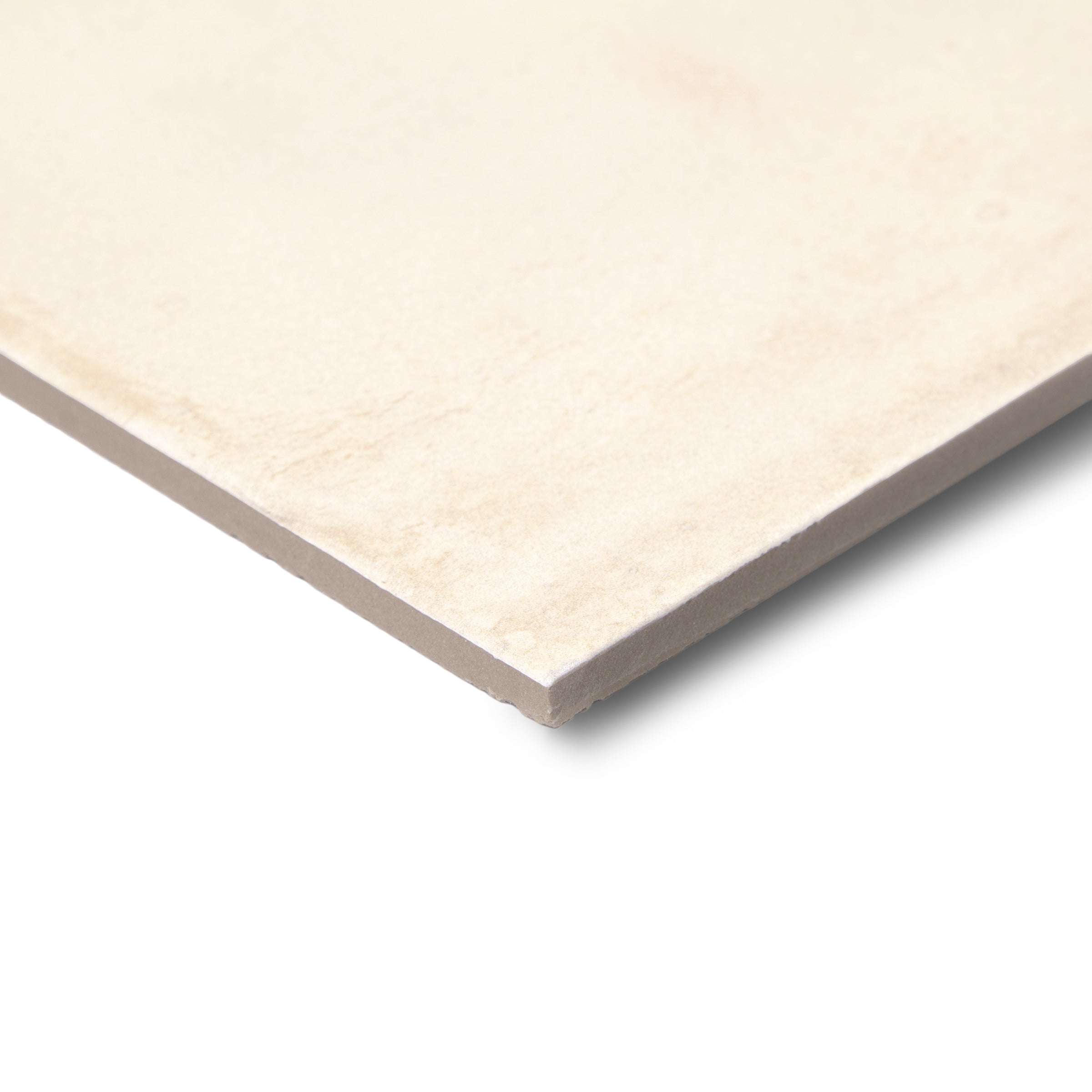 Close-up of a beige ceramic tile corner showing smooth texture and clean edges on a white background.