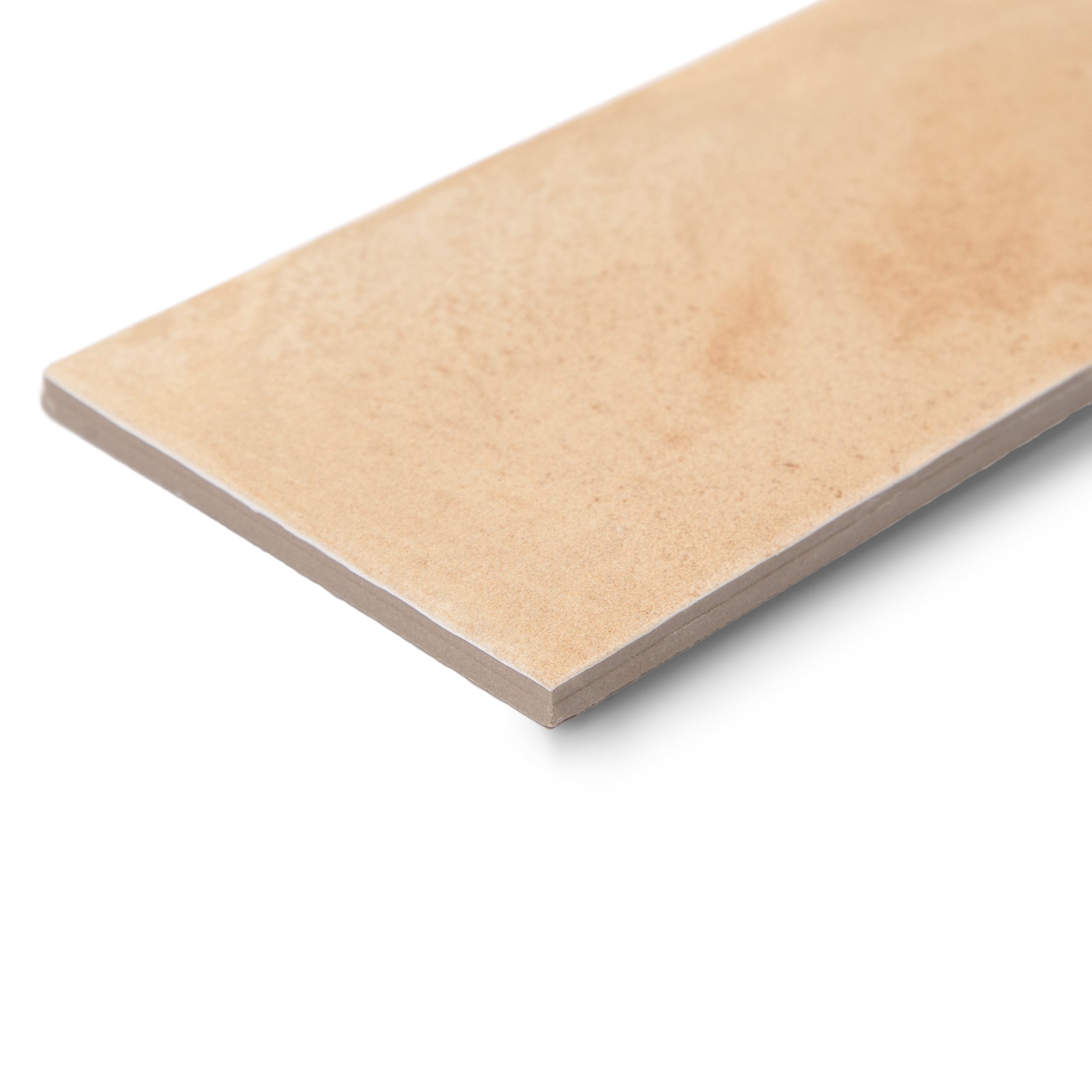 Single rectangular ceramic tile in warm beige with a smooth surface and subtle natural color variation