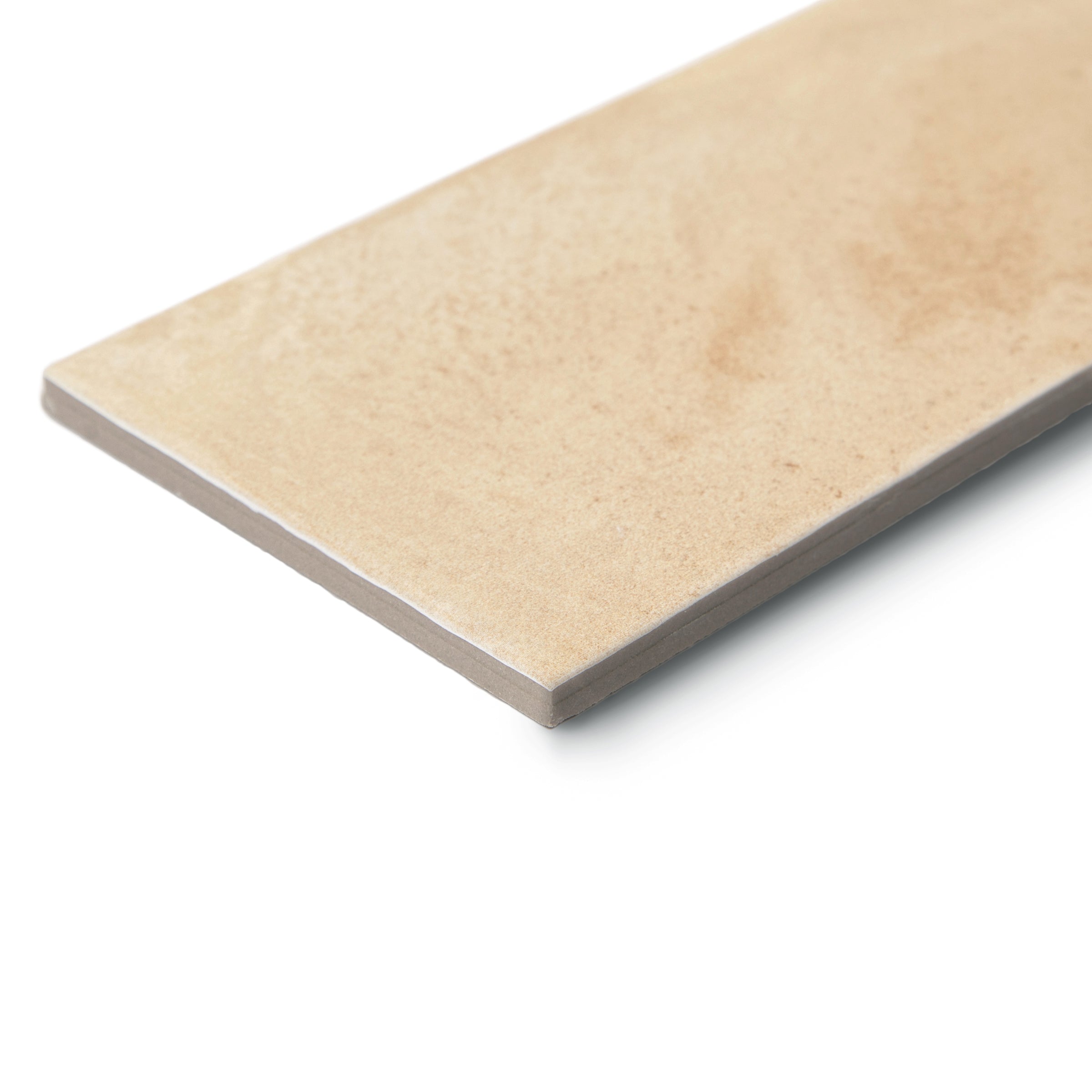 Beige ceramic tile with smooth surface and clean edges isolated on white background