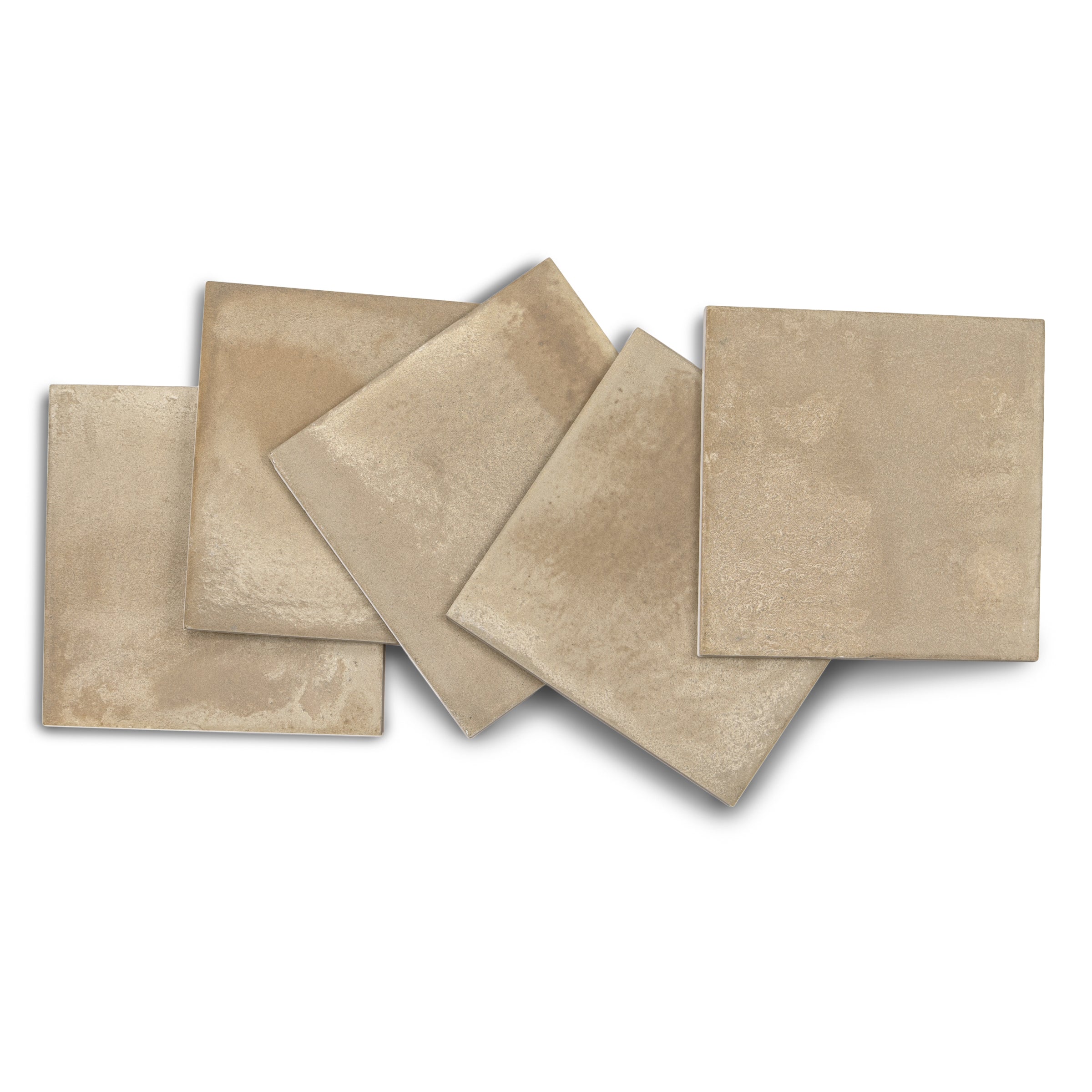 Five beige ceramic tiles arranged with overlapping edges on white background