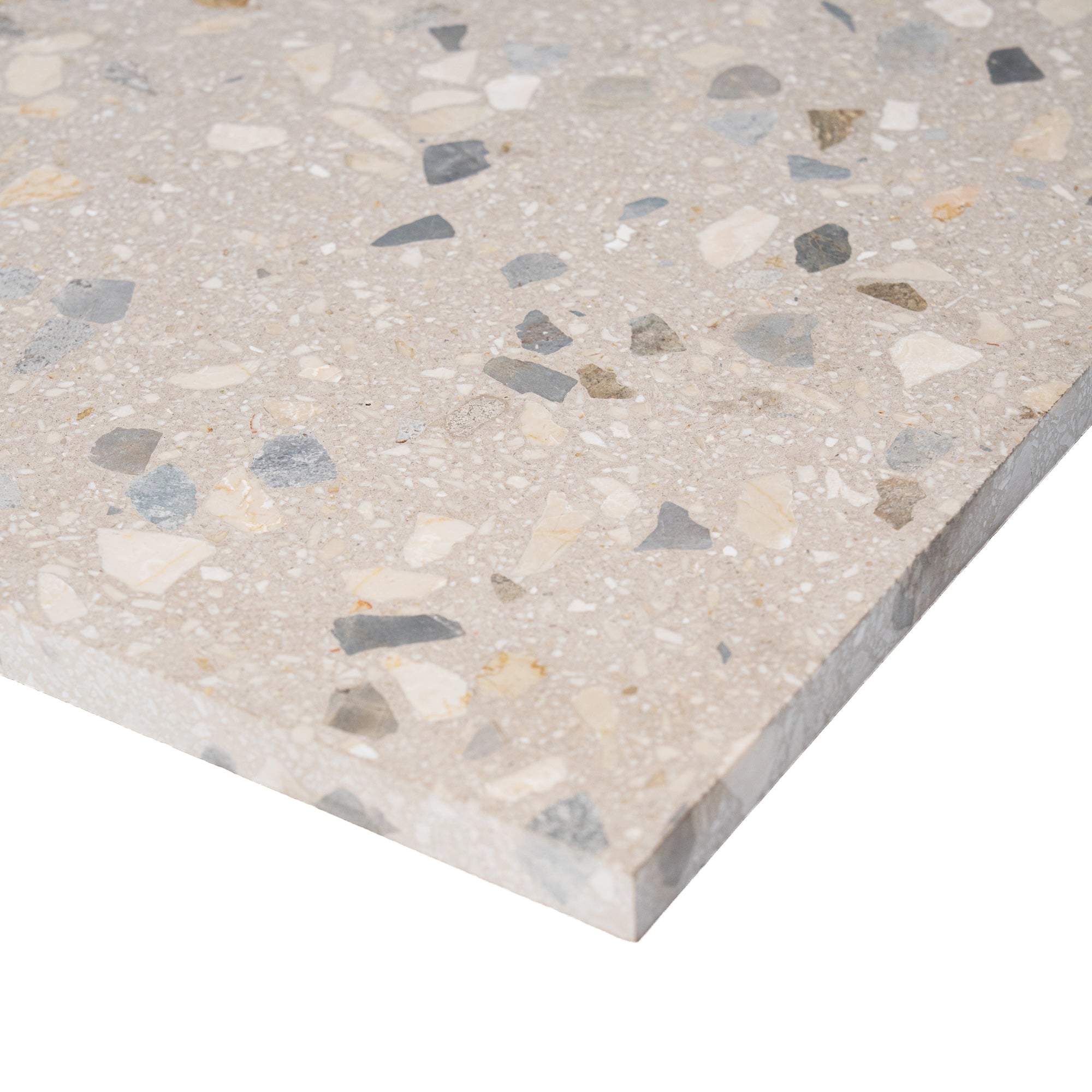 Beige terrazzo tile slab with multicolored stone chips and a visible edge