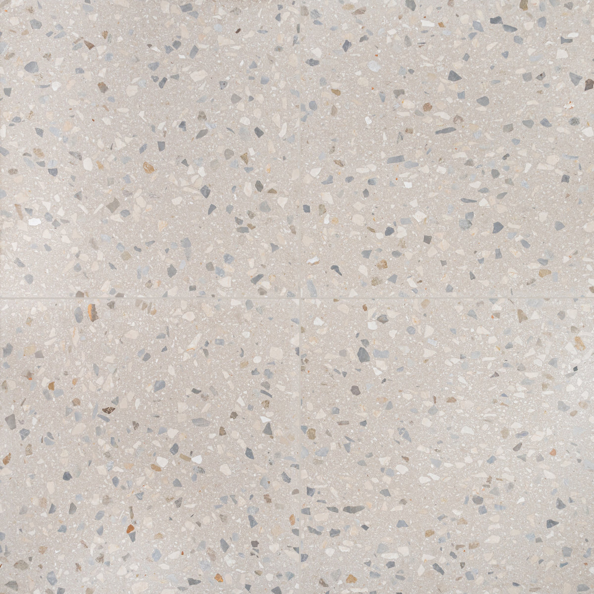 Light terrazzo tile surface with scattered gray, beige, and tan stone chips