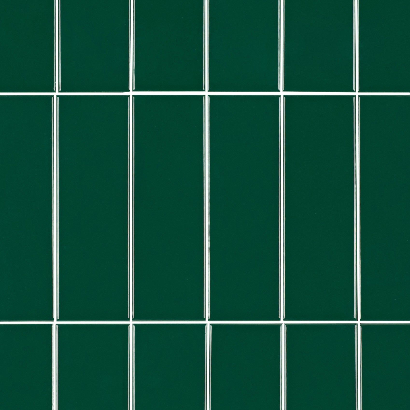 Colorblock Porcelain Tile in rich emerald green with glossy finish and clean grid layout from Small Format Tiles New Arrivals collection