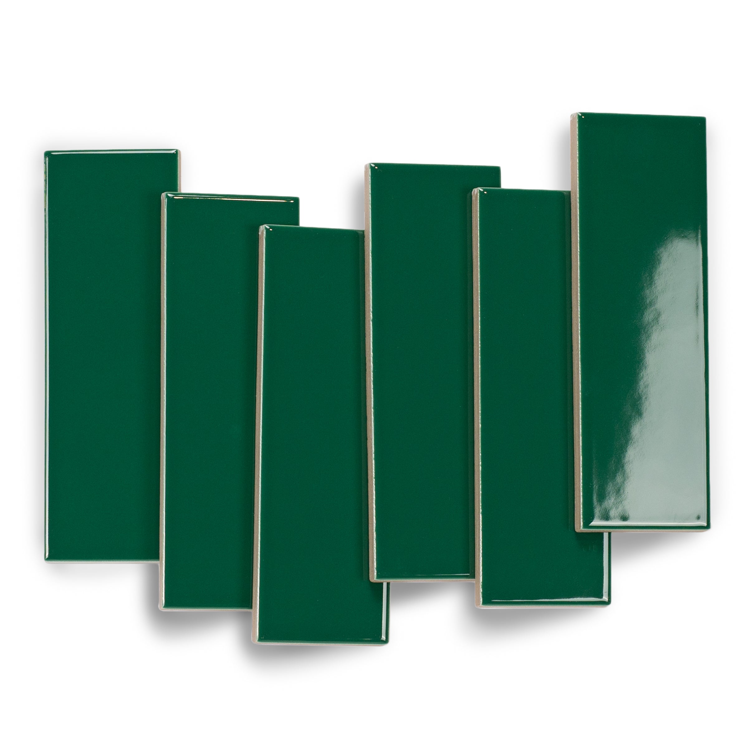 Glossy rectangular porcelain tiles in rich emerald green with smooth surfaces and clean edges on white background