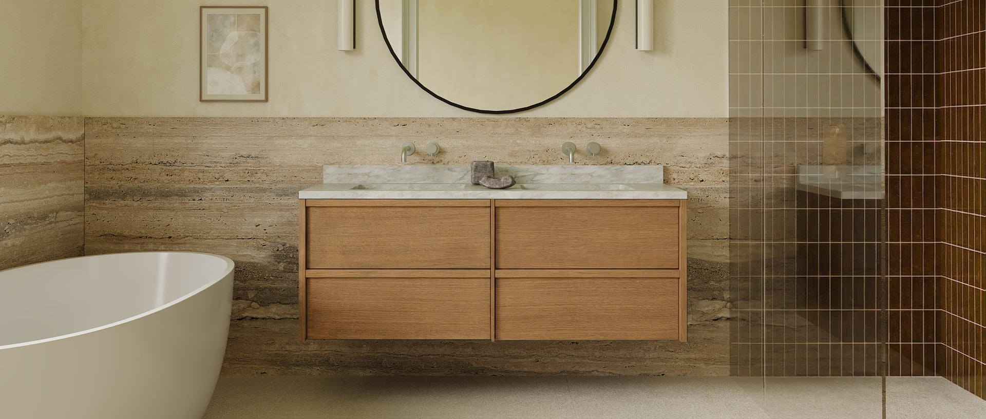 Minimalist bathroom with floating wooden vanity, round mirror, freestanding tub, and natural stone wall tiles.