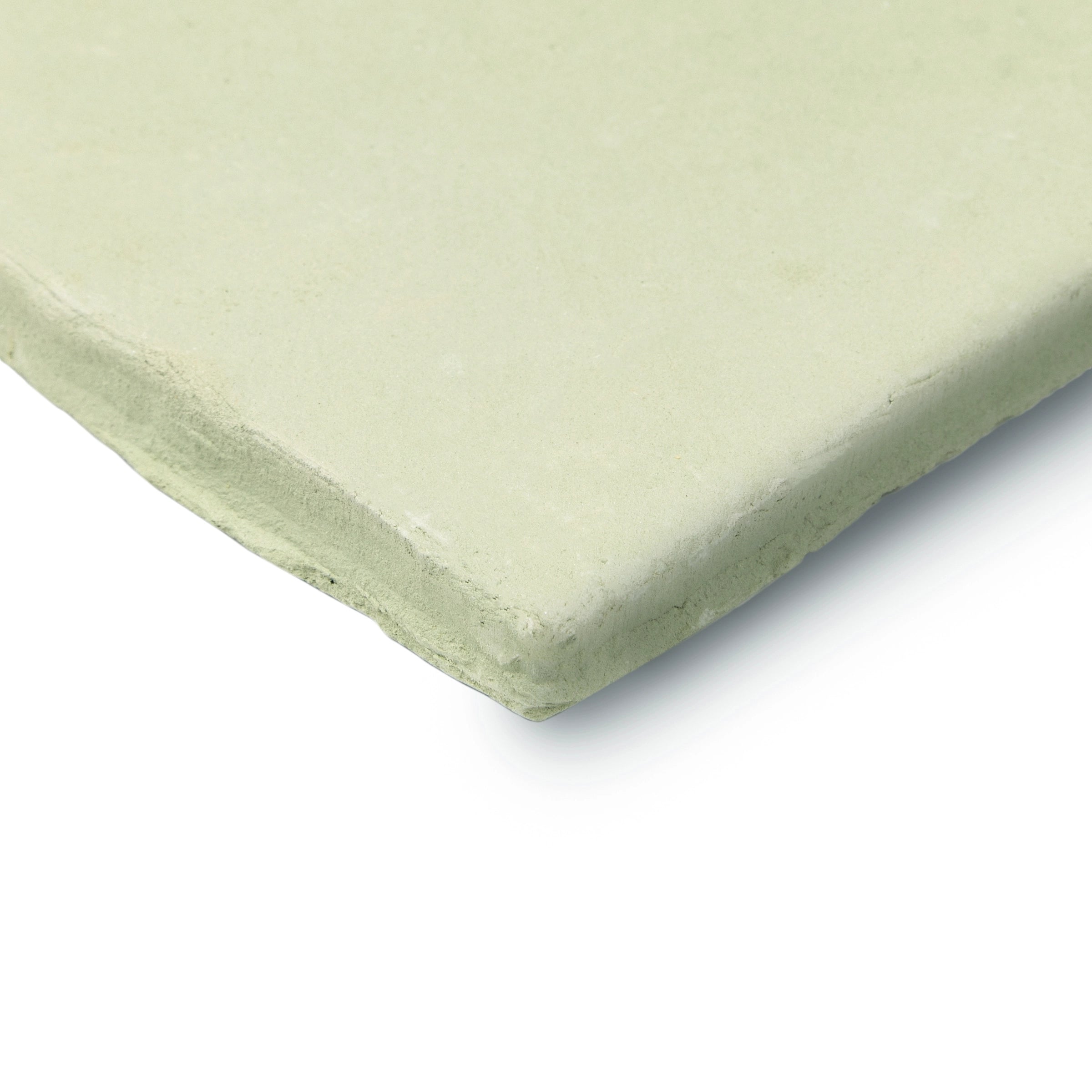 Close-up of a pale green ceramic tile with a matte surface and gently irregular edges on white background