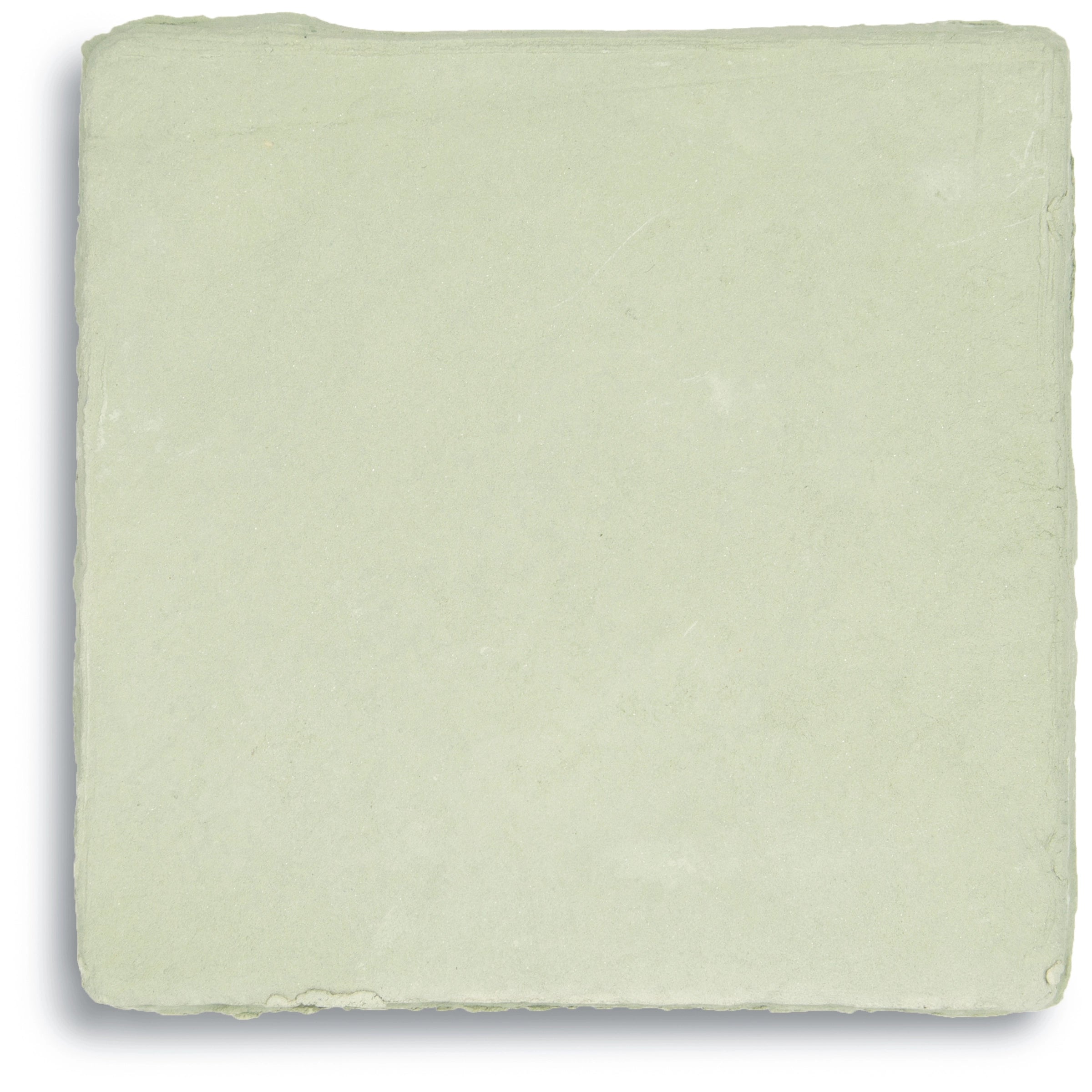 Soft pale green ceramic tile with a matte finish and slightly uneven edges on a neutral background