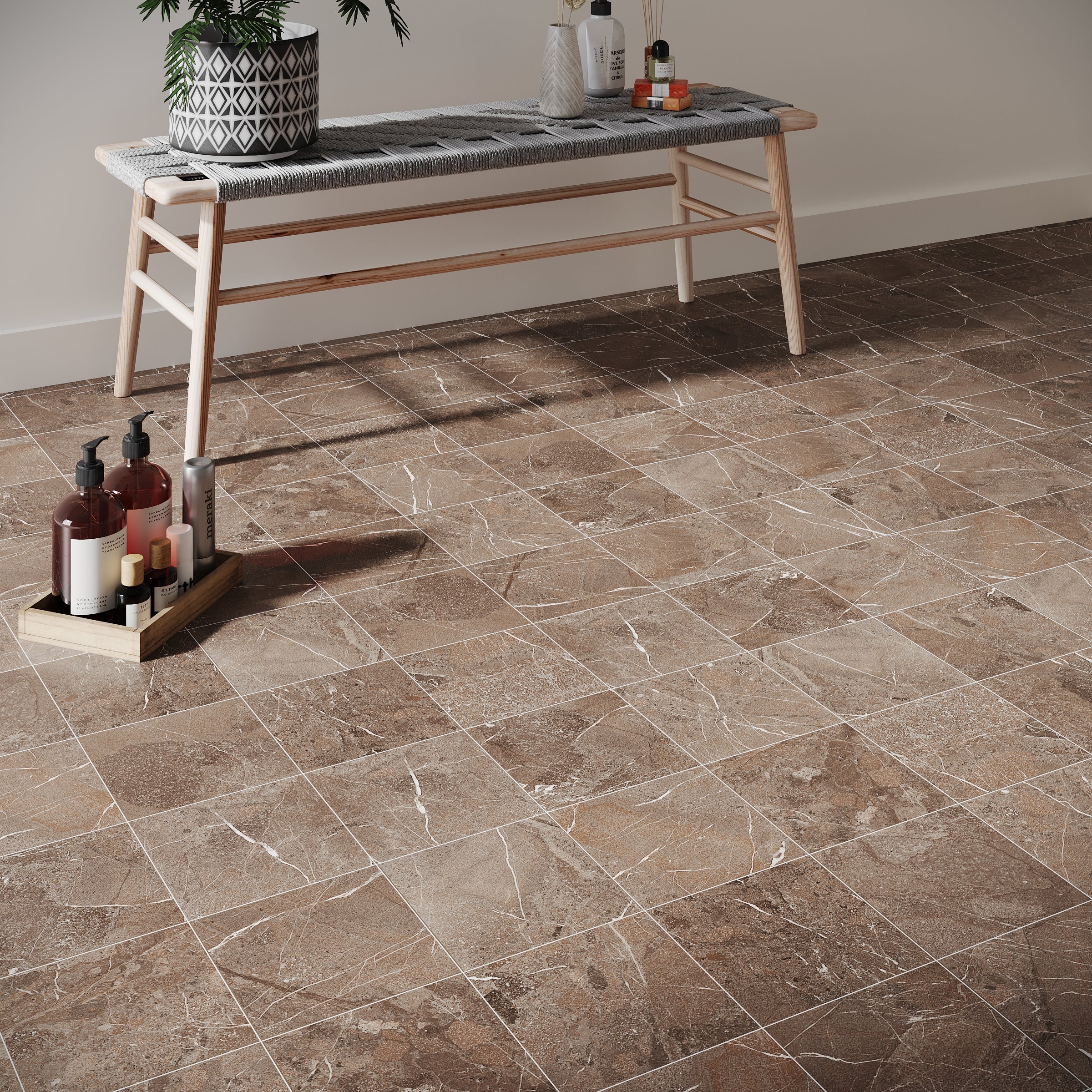 Brown marble-effect floor tiles arranged in a grid pattern under a woven bench with decor items