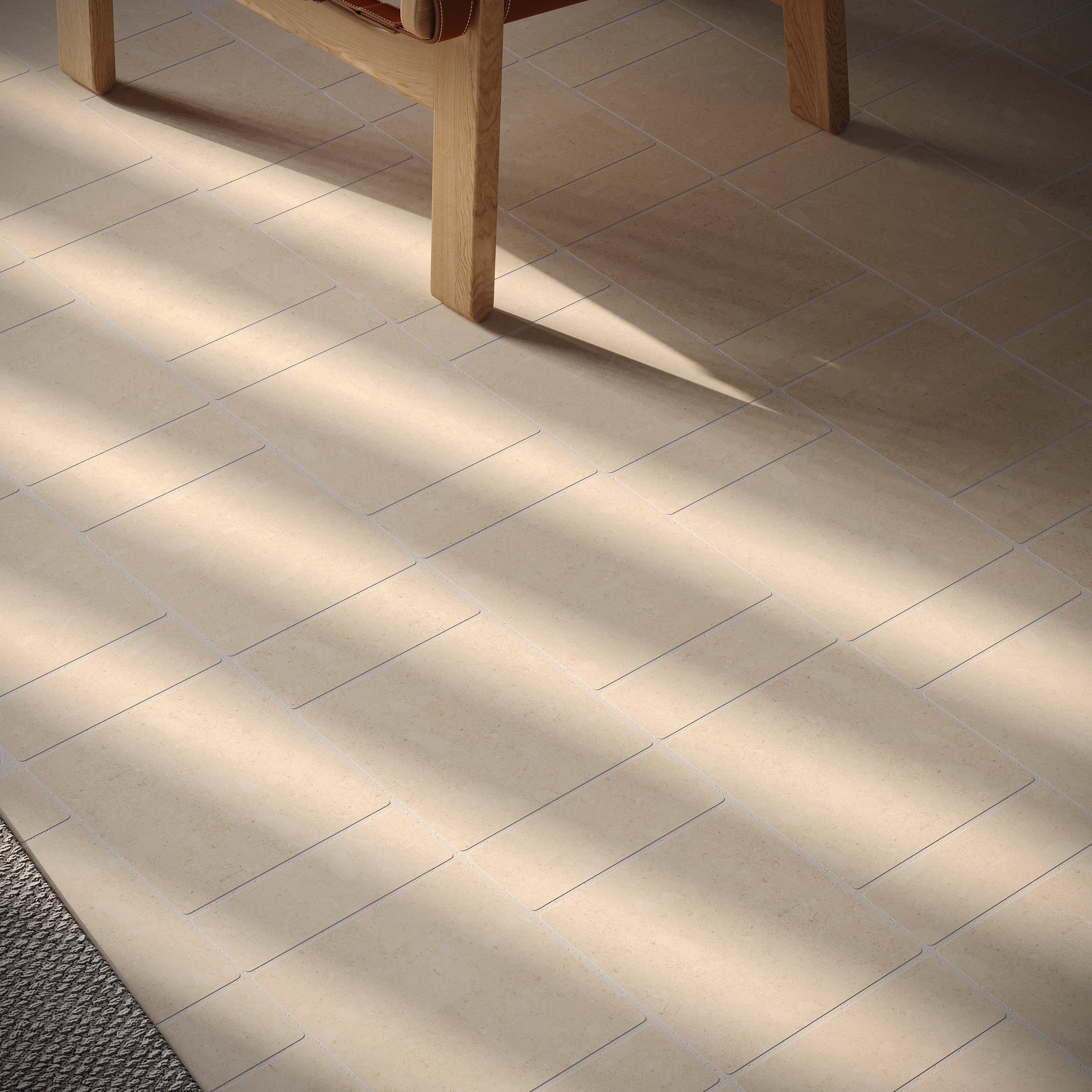 Ivory matte porcelain tile flooring with narrow grout lines and sunlight casting soft shadows from wooden furniture legs