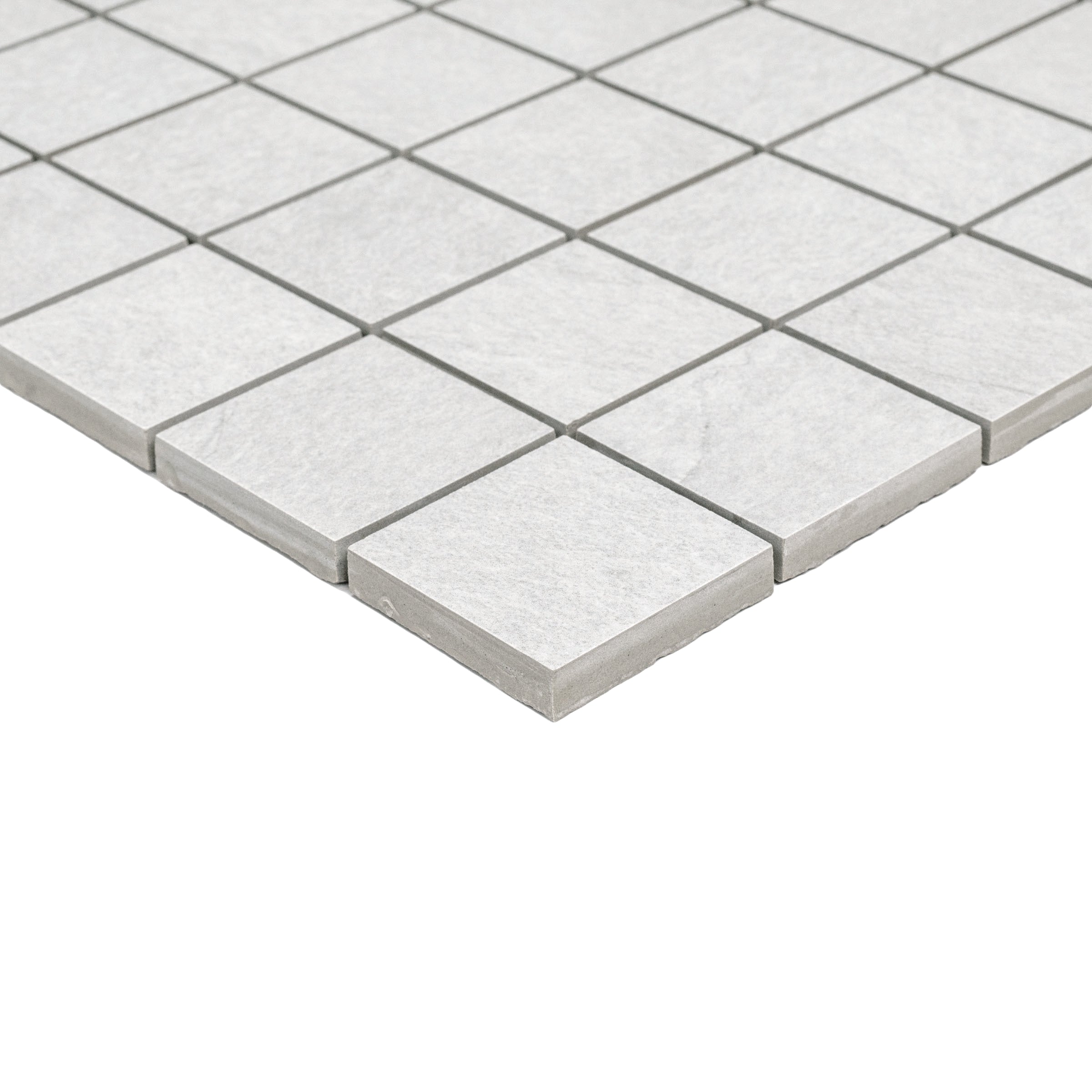 Sheet of small pearl-toned porcelain tiles with a soft matte finish and thin grout lines arranged in a square grid pattern