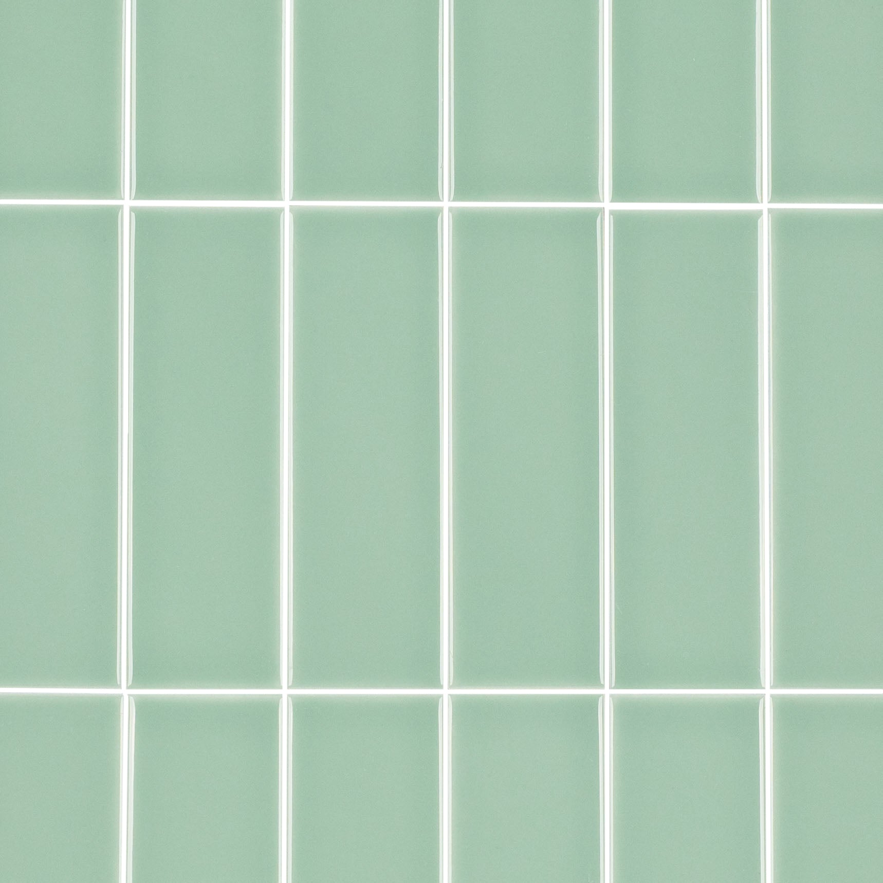 Colorblock Porcelain Tile in soft mint green with glossy finish and clean grid pattern from Small Format Tiles New Arrivals Porcelain collection