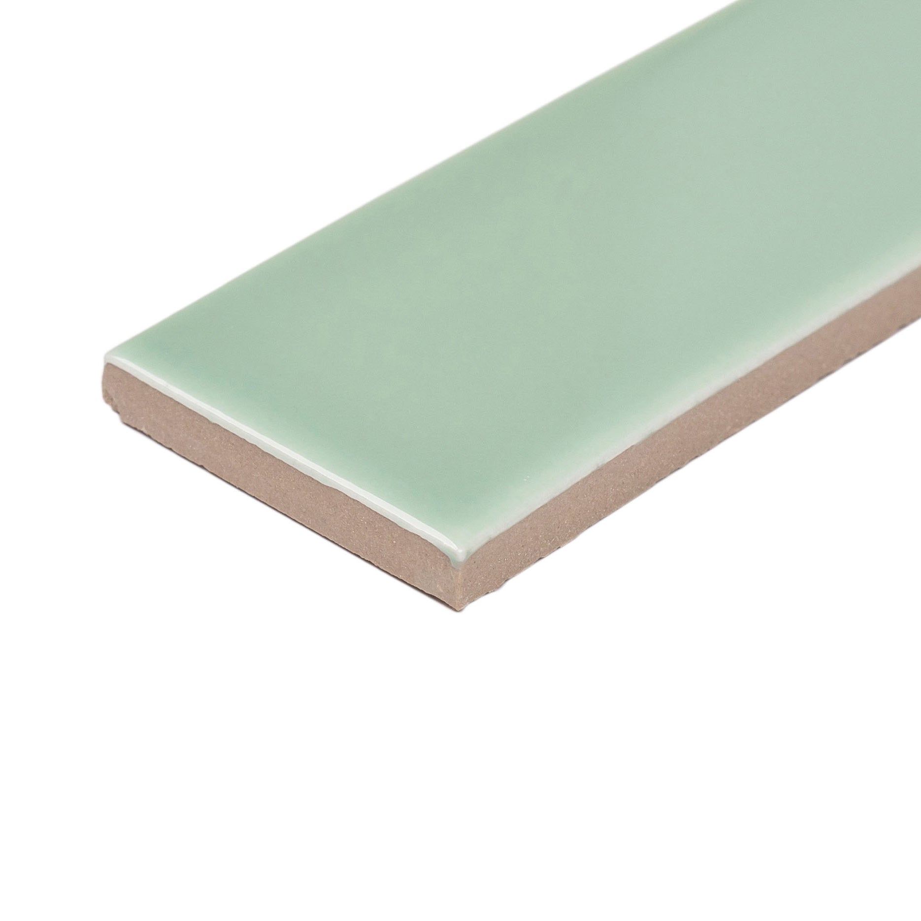 Smooth mint green ceramic tile with glossy finish and straight edges isolated on white background