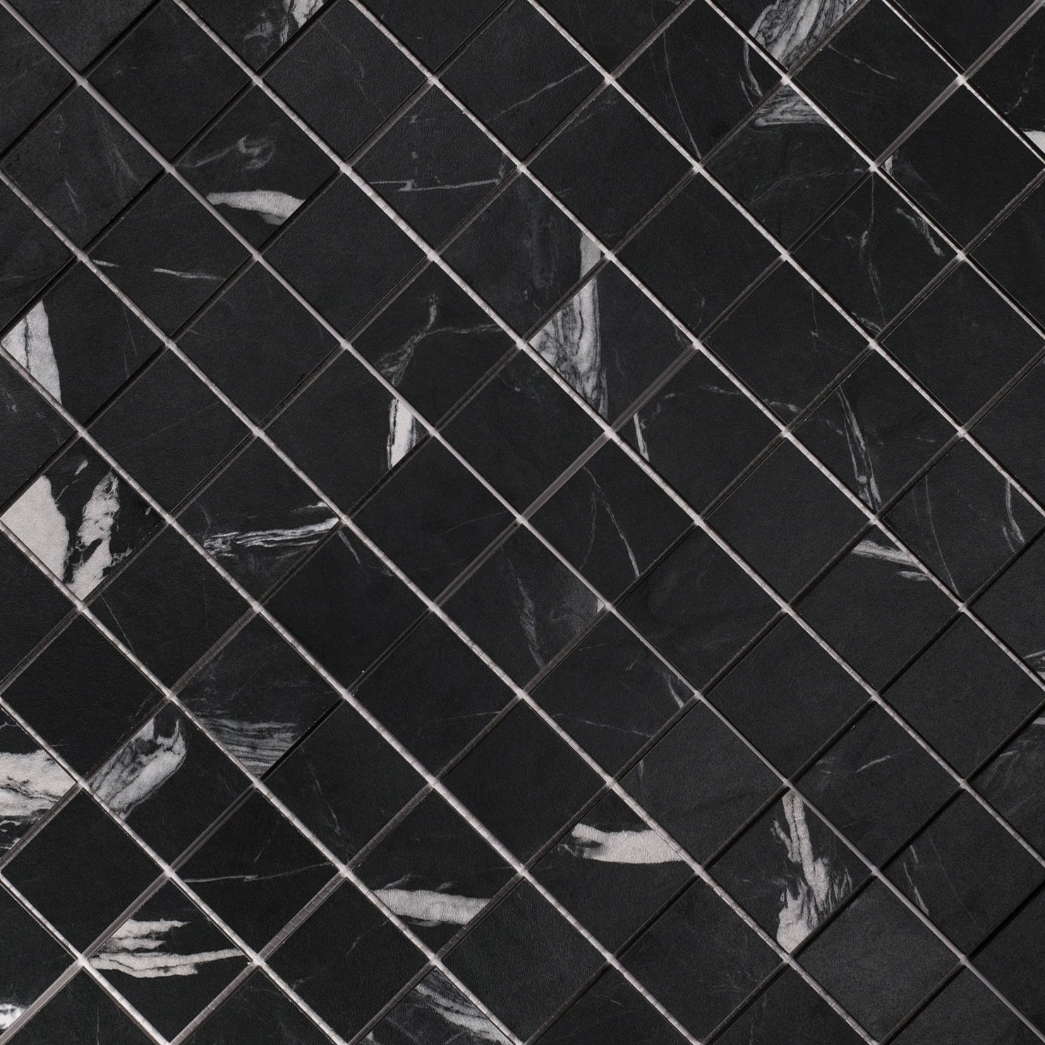Montblack 12x12 Matte Porcelain Mosaic in deep black with bold white veining from Marble Editions Porcelain Tile collection