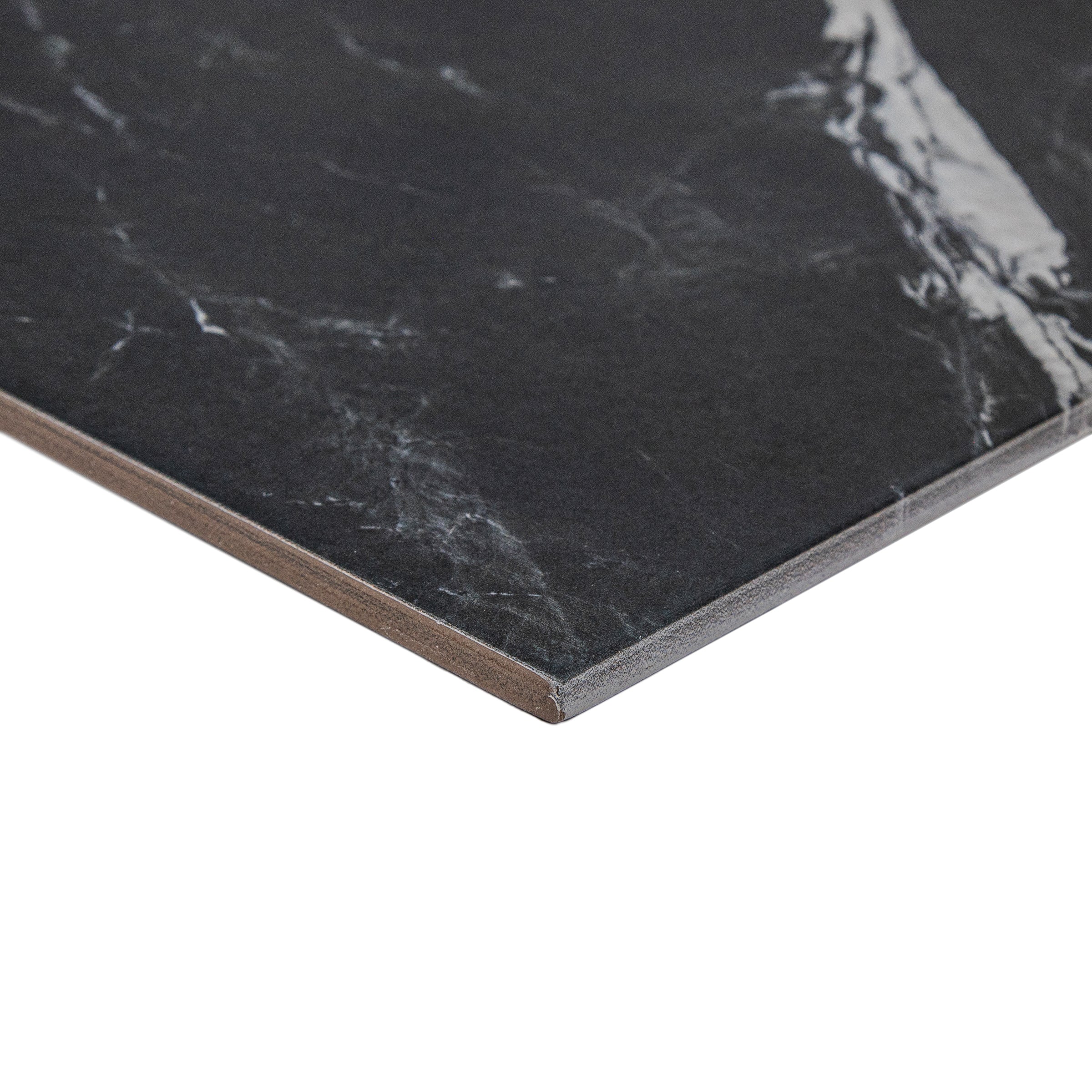 Montblack Marble Look Porcelain Tile Sample from Porcelain collection, showcasing stone-like ceramic tile texture.