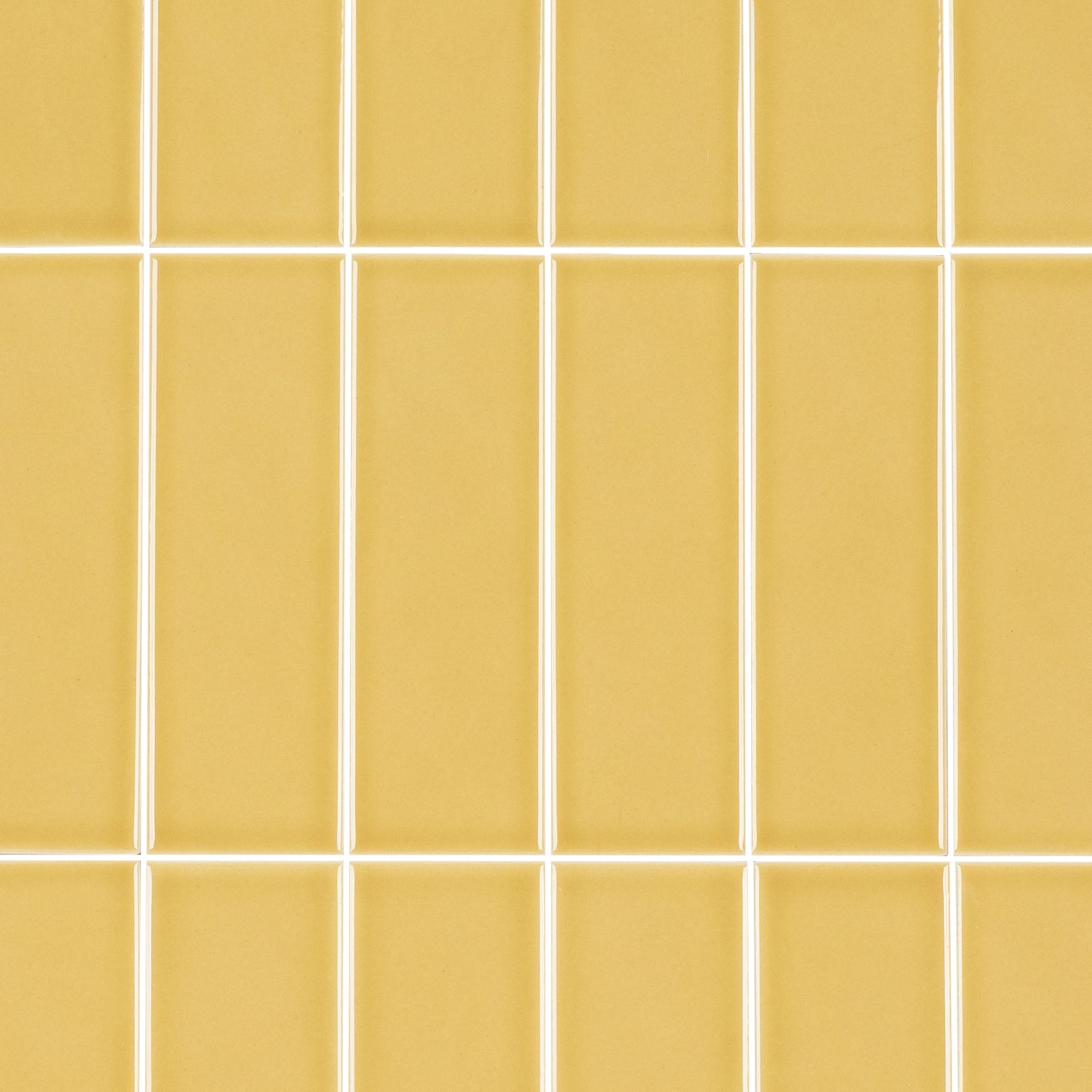 Colorblock Porcelain Tile in warm mustard glossy finish with clean grid pattern from Small Format Tiles New Arrivals collection