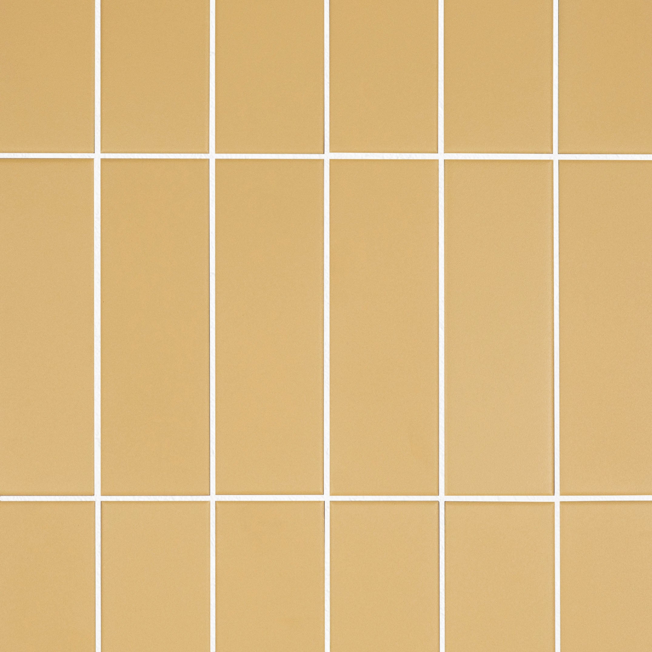 Colorblock Porcelain Tile in matte mustard yellow with clean 2x6 layout from Small Format Tiles New Arrivals collection