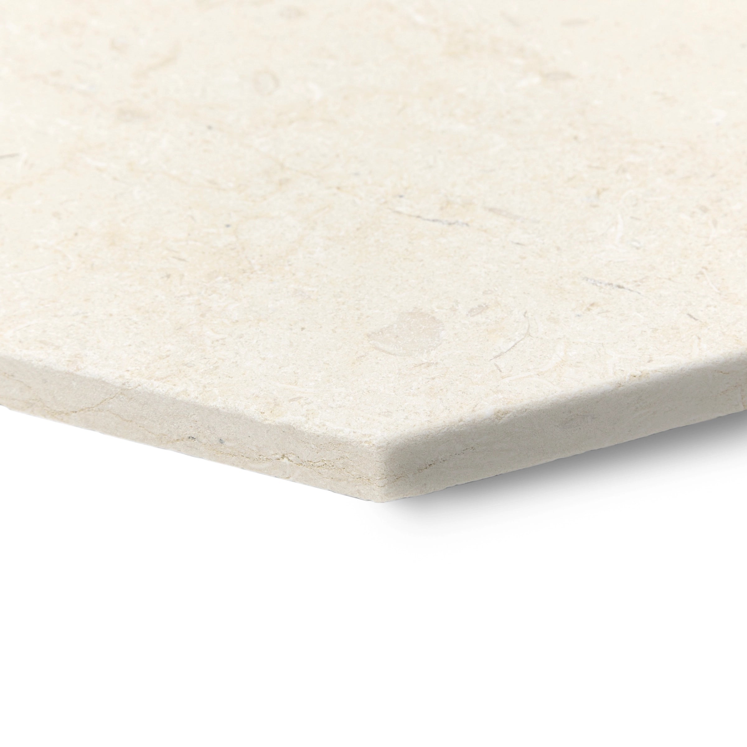 Creamy beige octagonal stone tile with a subtly textured surface and delicate fossil-like veining details
