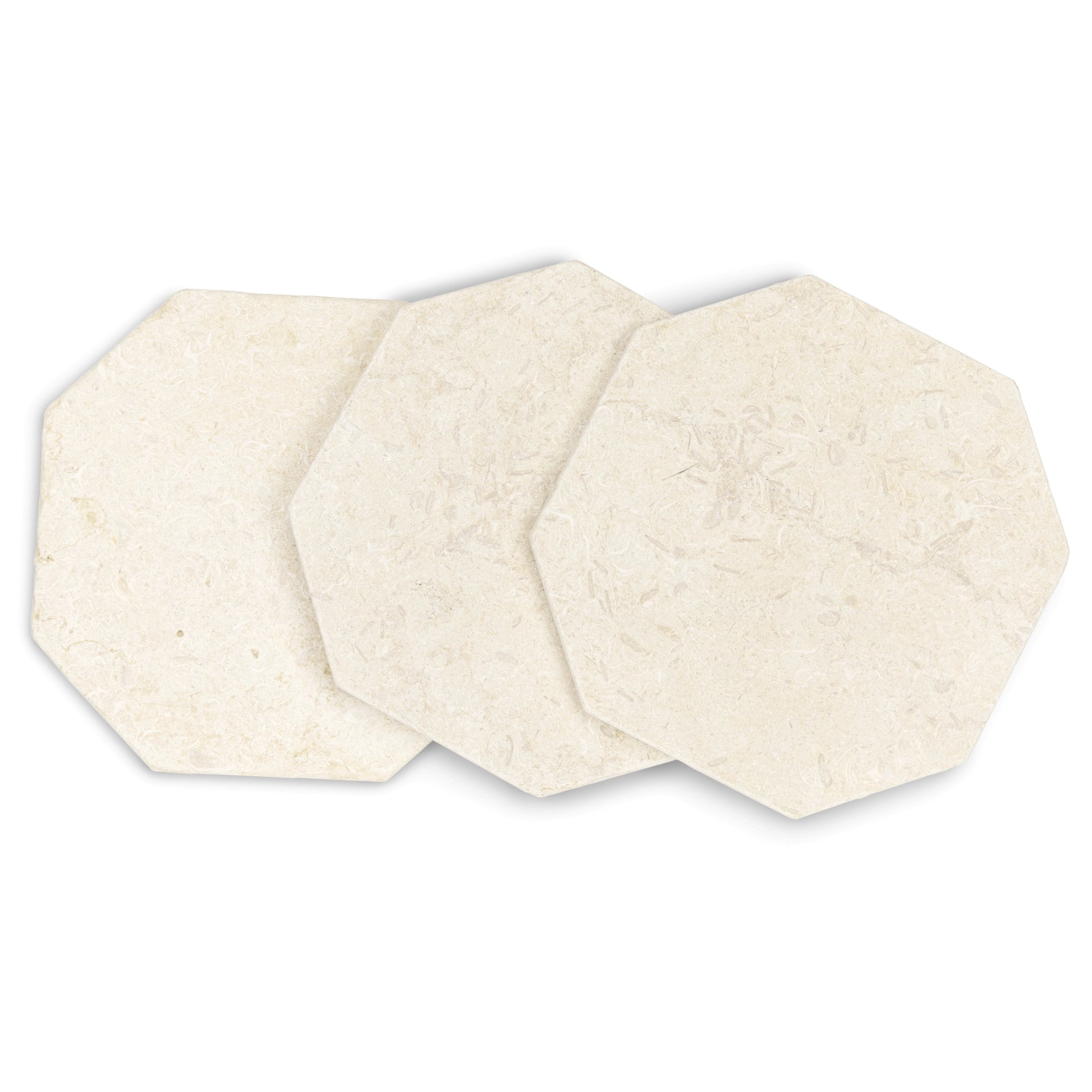 Three overlapping light cream octagonal stone tiles with subtle natural texture and fossil-like details