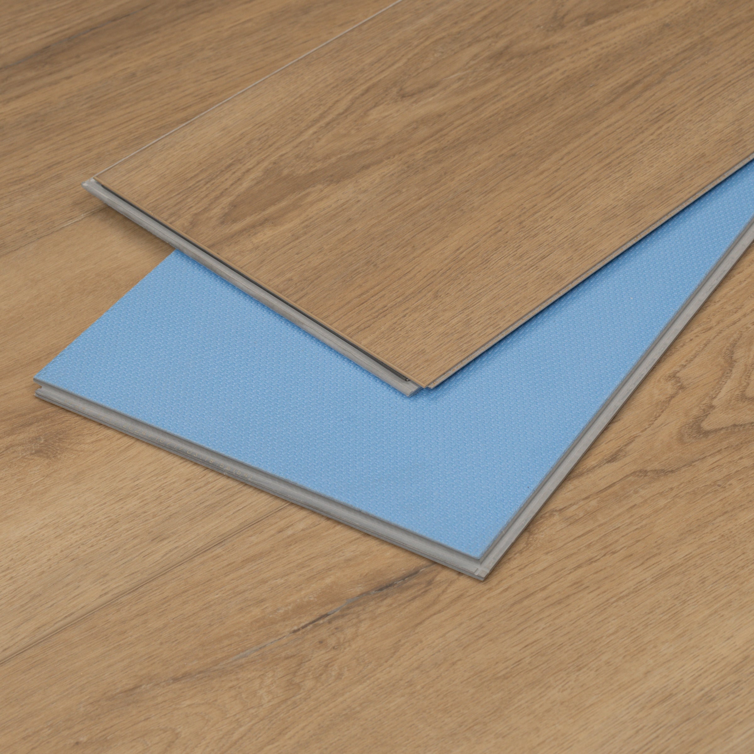 No. 11 9x60 Rigid Core Vinyl Flooring in brown and beige tones with oak grain from Vinyl Floor New Arrivals at Reno Source