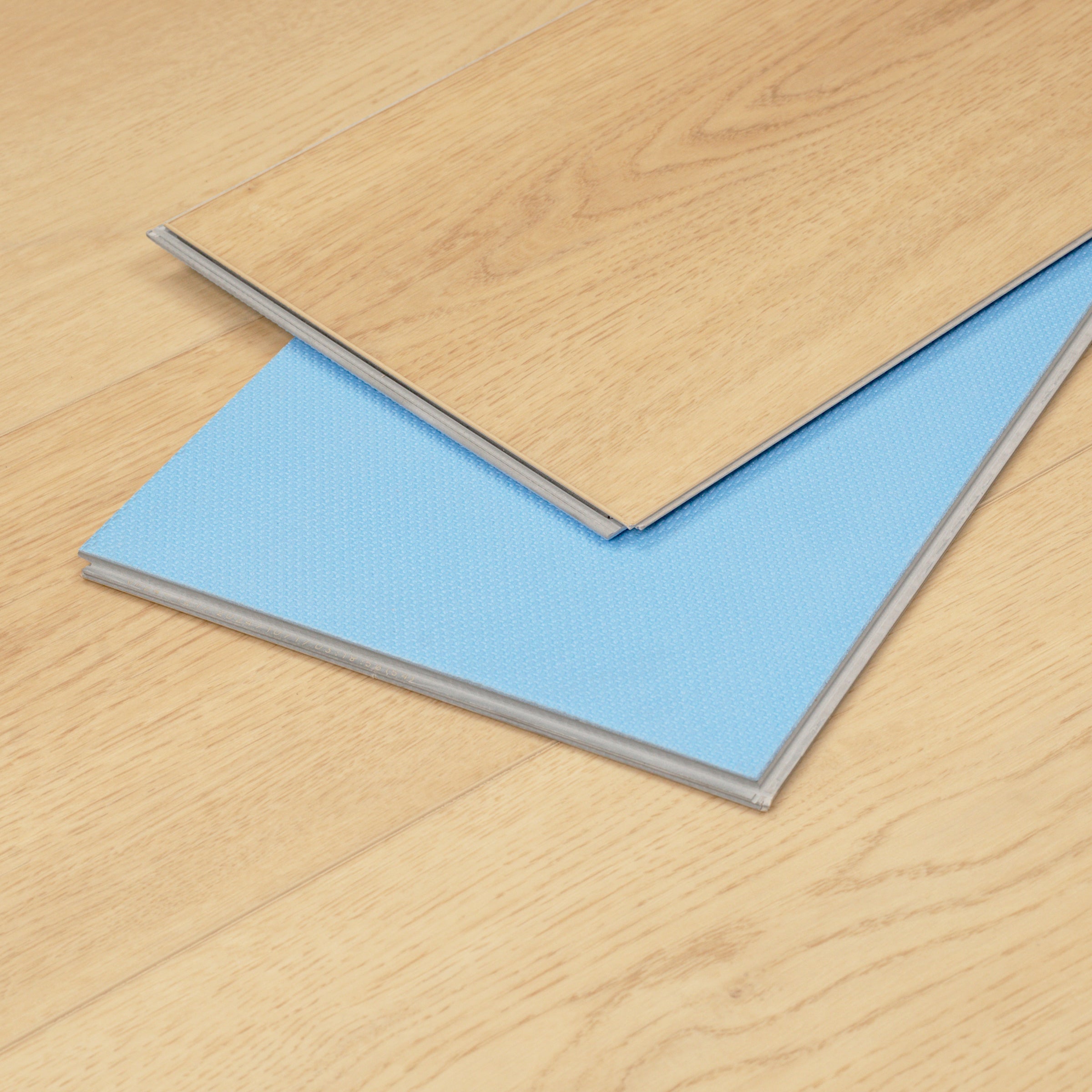 No. 15 9x60 Rigid Core Vinyl Flooring in pale brown and beige tones from Vinyl Floor New Arrivals at Reno Source