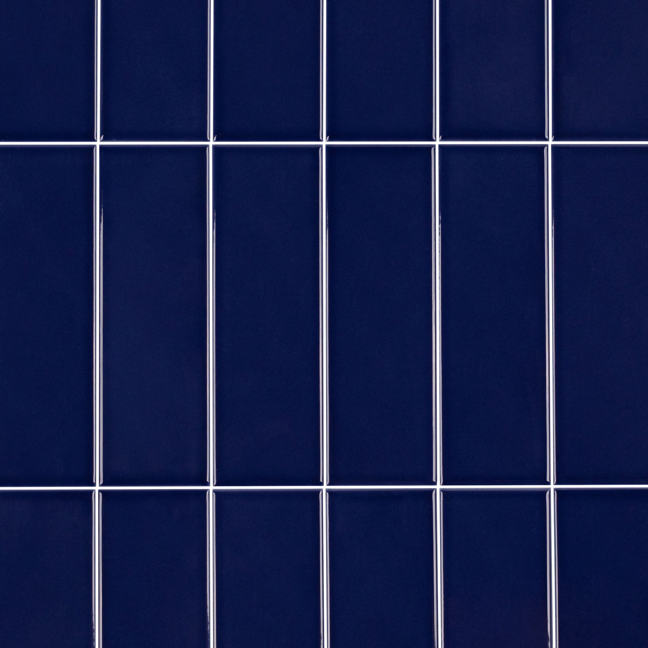 Colorblock Porcelain Tile in deep navy with glossy finish and clean grid from Small Format Tiles New Arrivals collection