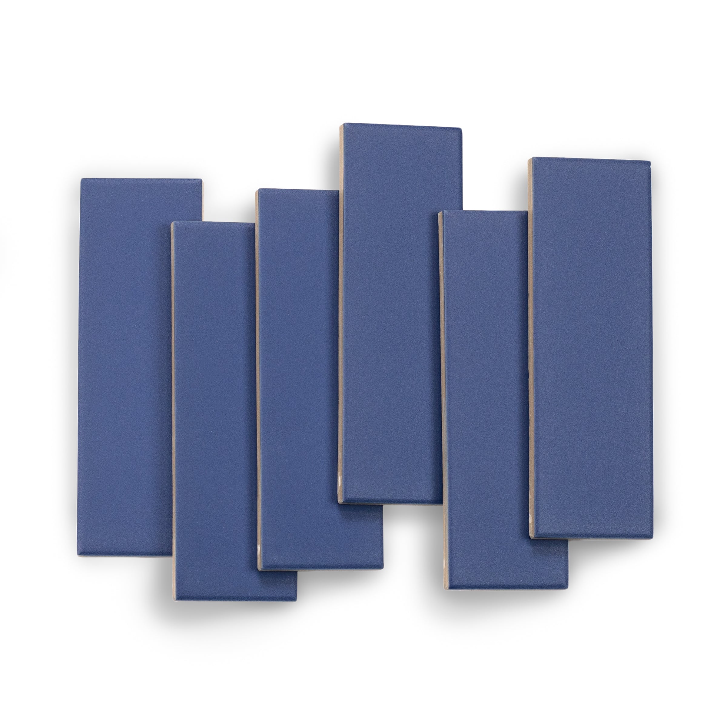 Six vertically arranged matte porcelain tiles in rich ocean blue with smooth surfaces on white background