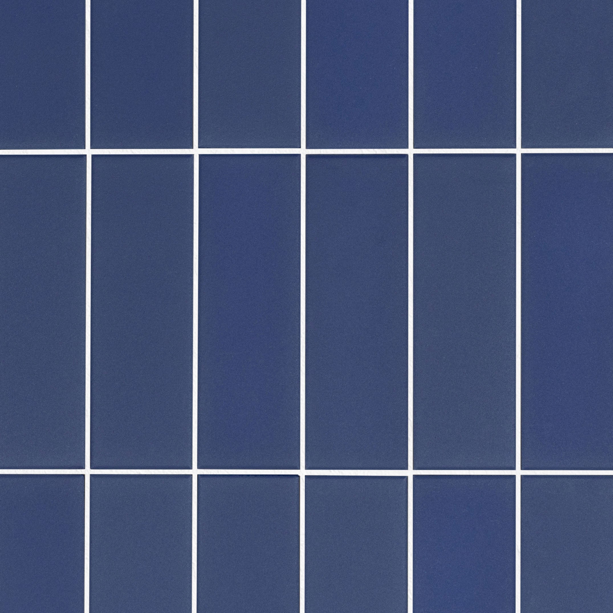 Colorblock Porcelain Tile in matte navy blue with clean 2x6 layout from Small Format Tiles New Arrivals Porcelain collection