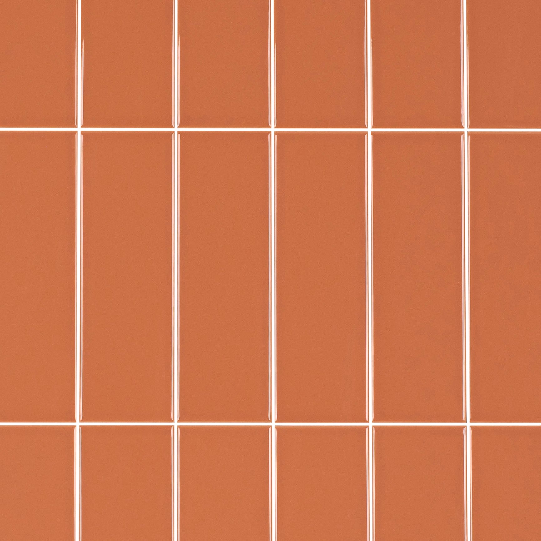 Colorblock Porcelain Tile in glossy orange with clean 2x6 grid from Small Format Tiles New Arrivals Porcelain collection