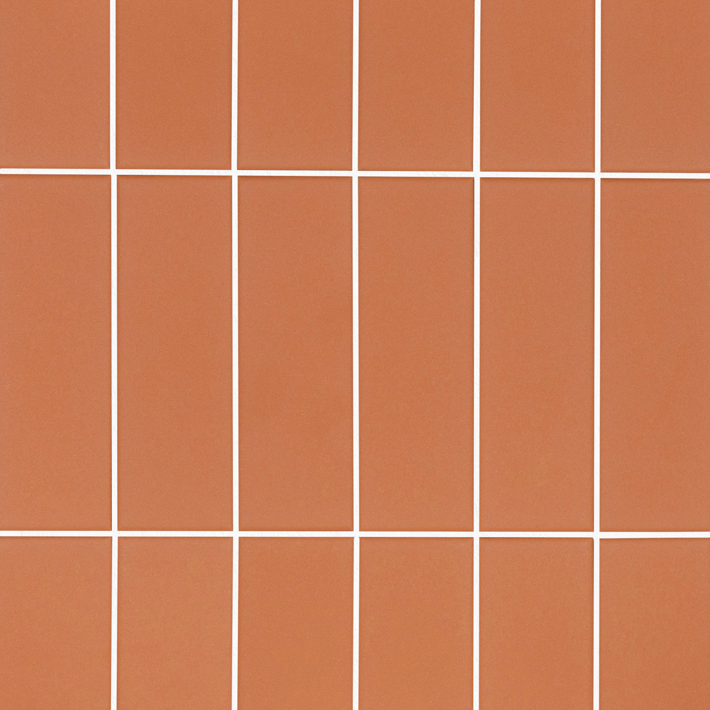 Colorblock Porcelain Tile in matte orange with clean 2x6 grid from Small Format Tiles New Arrivals Porcelain collection