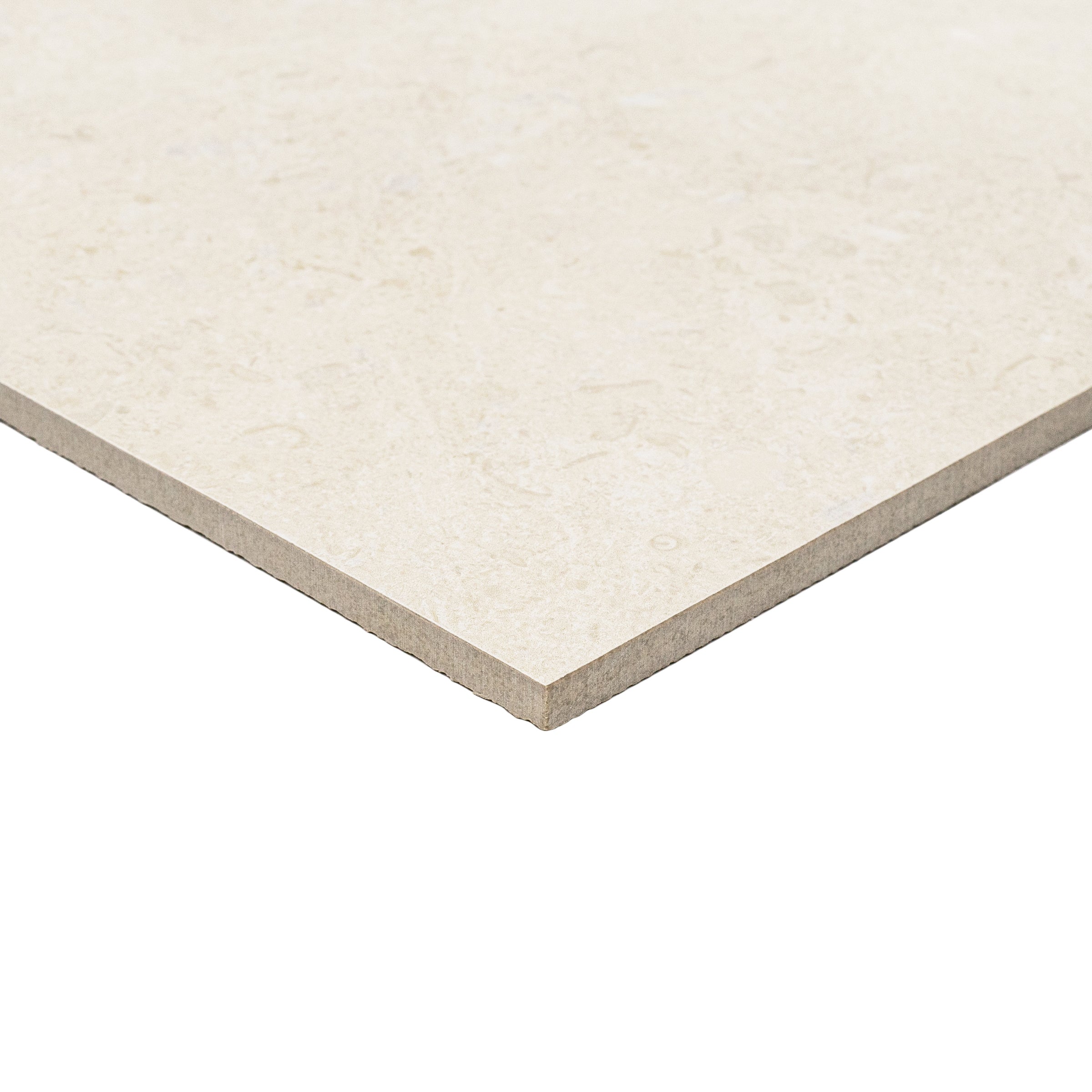 Close-up of a smooth, natural ivory porcelain tile with subtle stone-like texture and soft matte finish