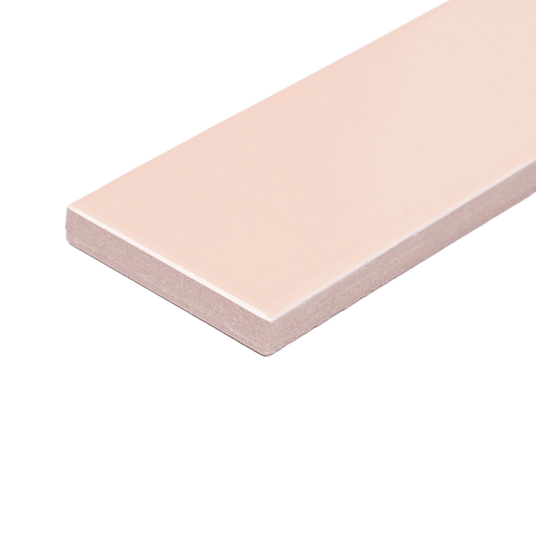 Smooth porcelain tile in soft blush tone with a glossy finish and clean, sharp edges on a white background