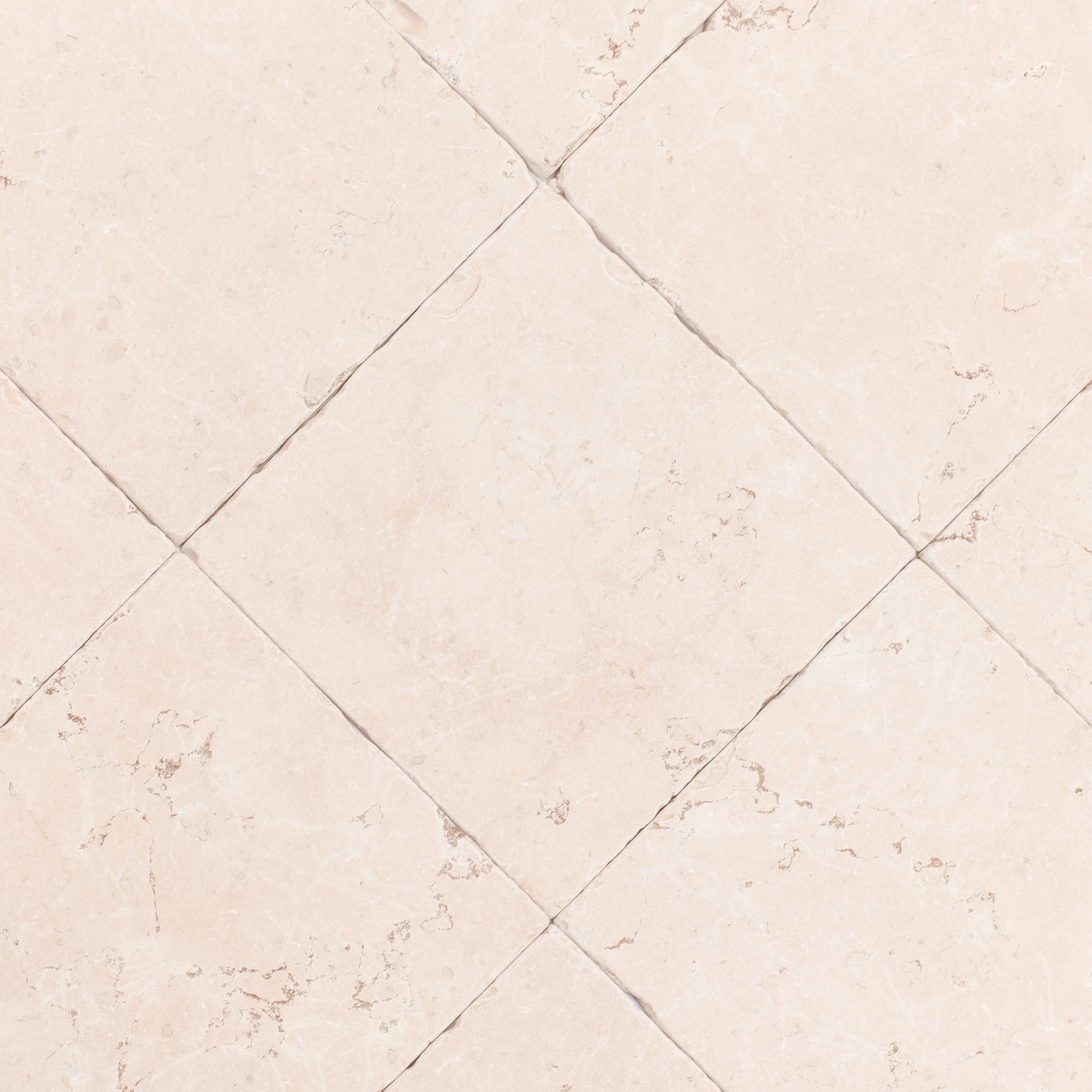 Soft beige ceramic tiles with a subtle natural stone texture arranged in a diagonal grid pattern on smooth flooring