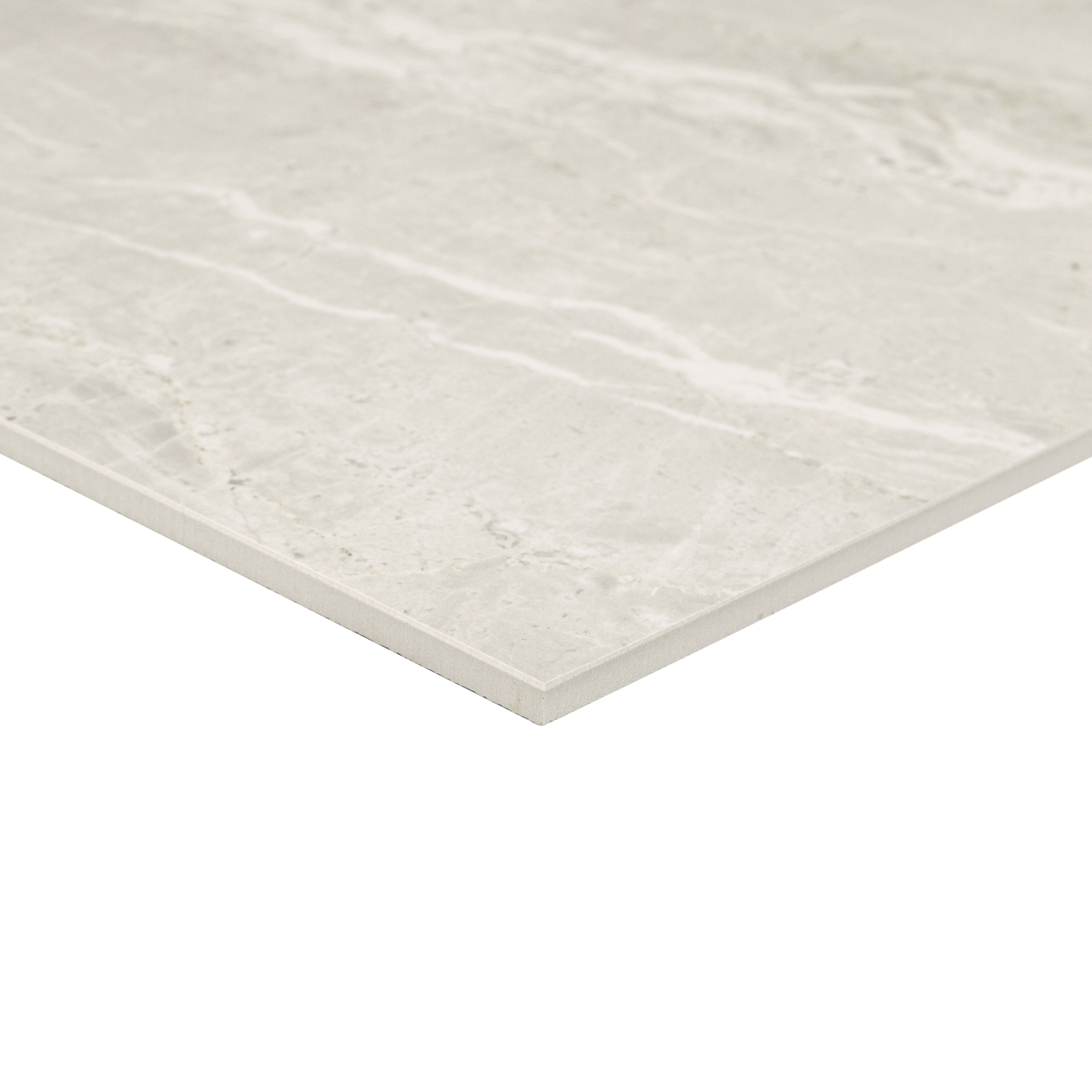 Ivory Marble Look Matte Porcelain Tile in layered pearl, soft grey, and warm cream tones from Large Format Tiles at Reno Source