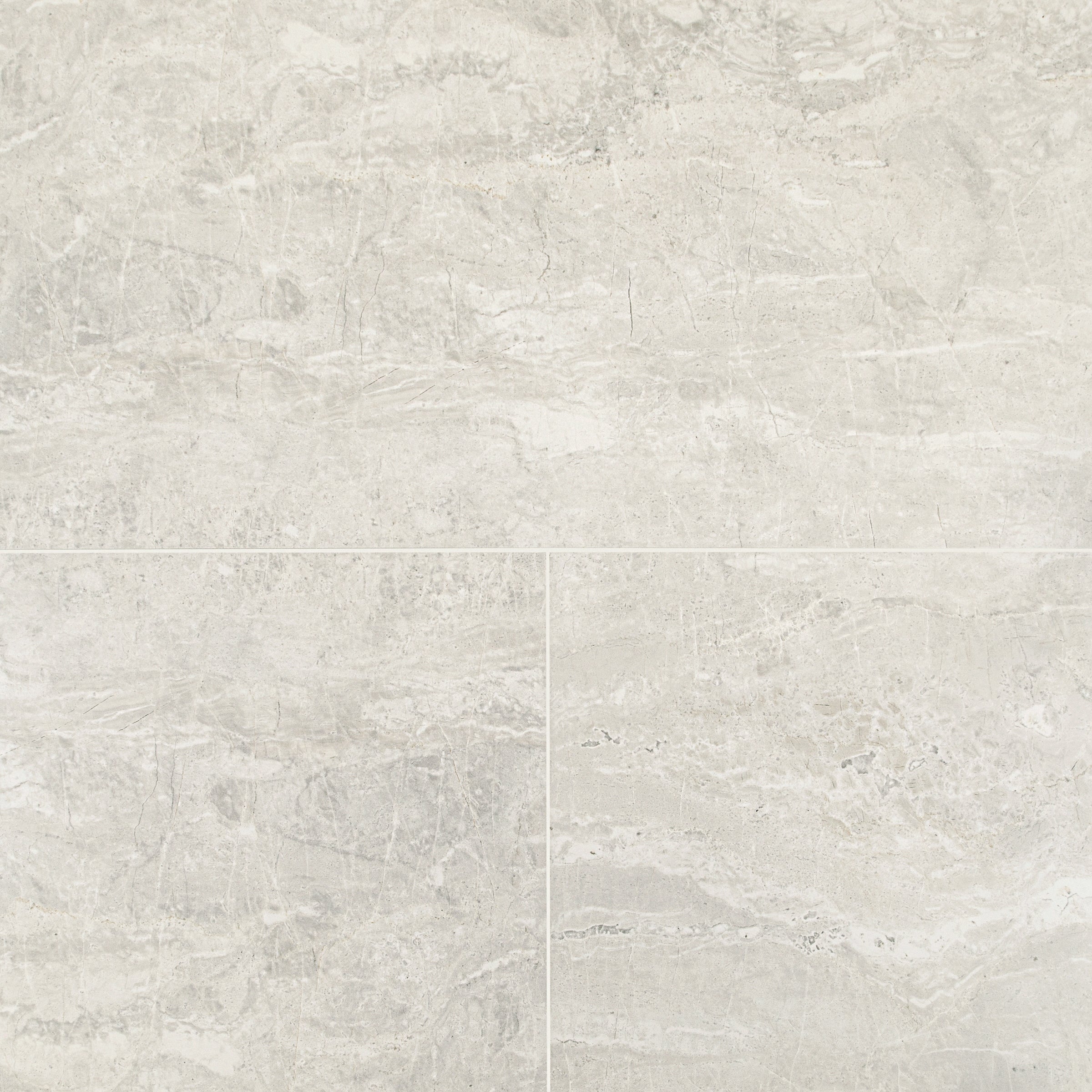 Ivory Marble Look Matte Porcelain Tile in layered pearl and warm cream tones from Large Format Tiles at Reno Source